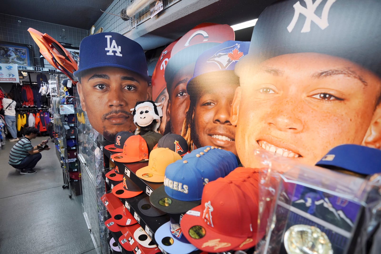 Goods related to Shohei Ohtani of the Los Angeles Dodgers are displayed at a sporting goods store, "SELECTION," in Shinjuku district Wednesday, Oct. 23, 2024 in Tokyo. (AP Photo/Eugene Hoshiko)