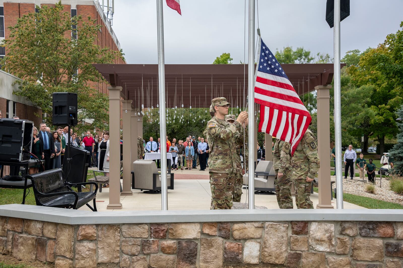 About 150 people attended the dedication ceremony Friday, Sept. 8, 2023, for the Captain Shawn L. English Champion Garden, an outdoor space that honors veterans, military-connected students and those who support them, outside the Veteran and Military Center at Wright State University. CHRIS SNYDER/WRIGHT STATE UNIVERSITY