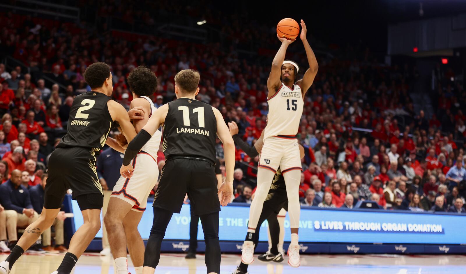 Dayton's DaRon Holmes II shoots against Oakland on Wednesday, Dec. 20, 2023, at UD Arena. David Jablonski/Staff