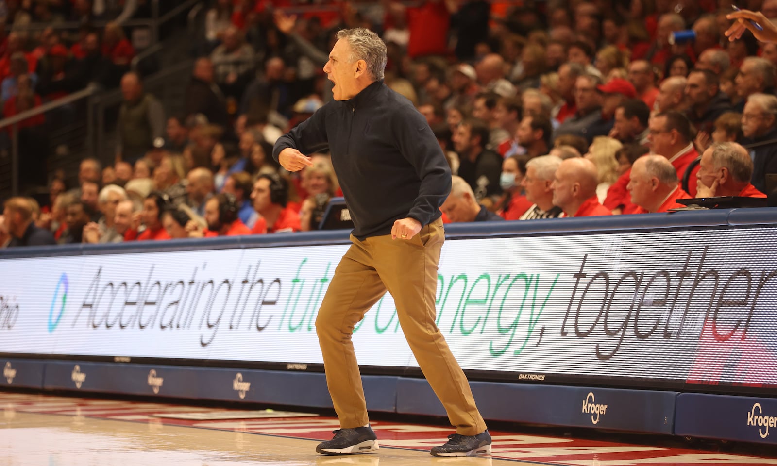 Duquesne's Keith Dambrot coaches during a game against Dayton on Wednesday, Dec. 28, 2022, at UD Arena. David Jablonski/Staff