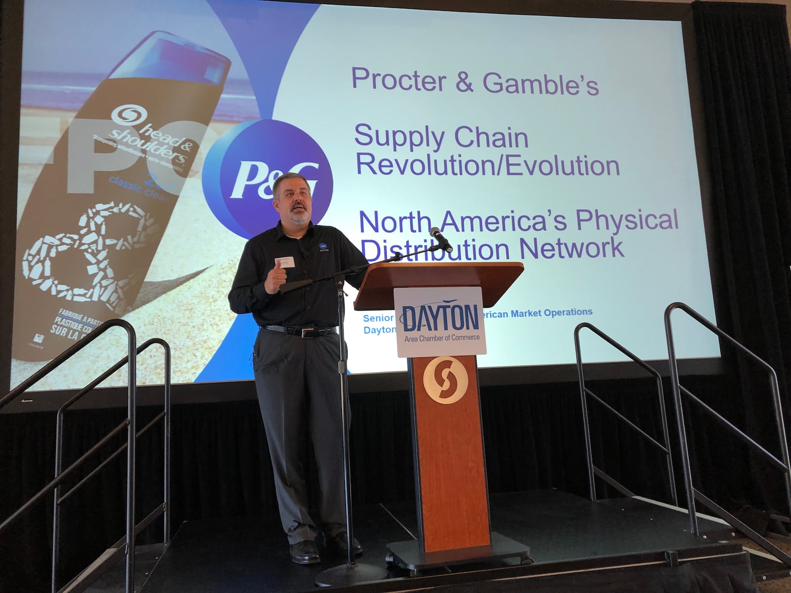 Ken Eckrote, senior director of market operations at Procter and Gamble's Dayton Mixing Center, speaks during the 6th Annual Southwest Ohio Logistics Conference at Sinclair Community College.