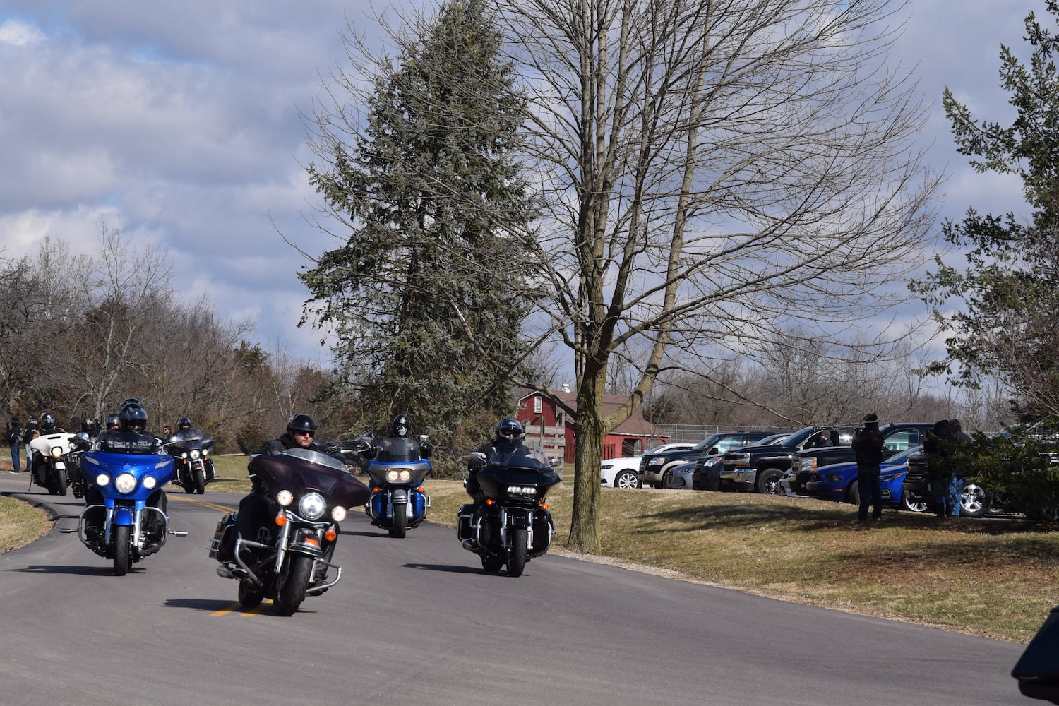 PHOTOS: Thousands of Outlaws attend motorcycle gang leaders funeral at Montgomery County Fairgrounds.