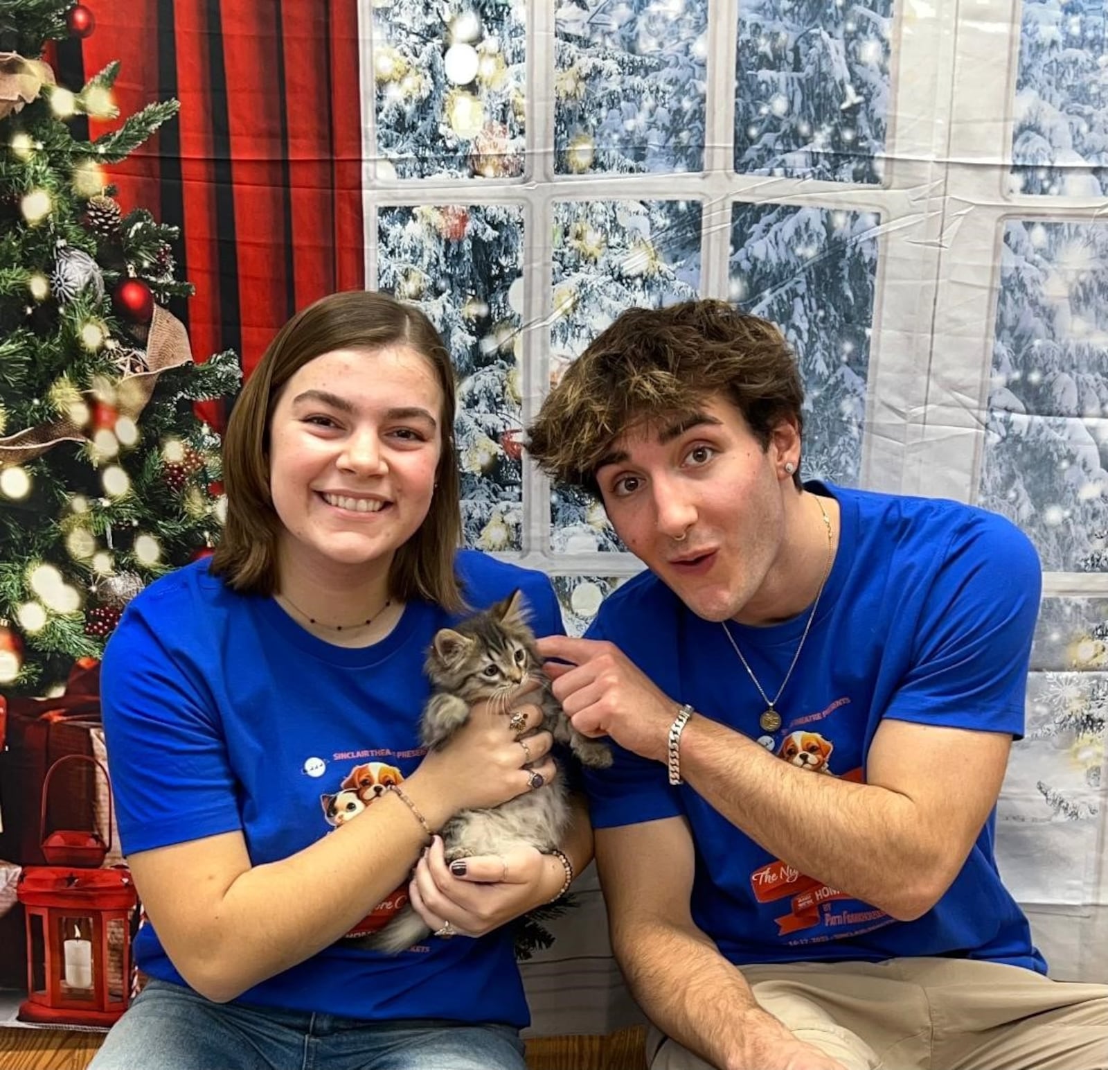 Amelie De la Nuez as Kia, the cat, and Ethan Harris as Duffy, the dog, get character development tips at the Humane Society on becoming rescue animals for their roles in Sinclair Theatre's "'Twas the Night Before Christmas and We're HOME ALONE!" in Blair Hall Dec. 14-17. PHOTO BY PATTI CELEK