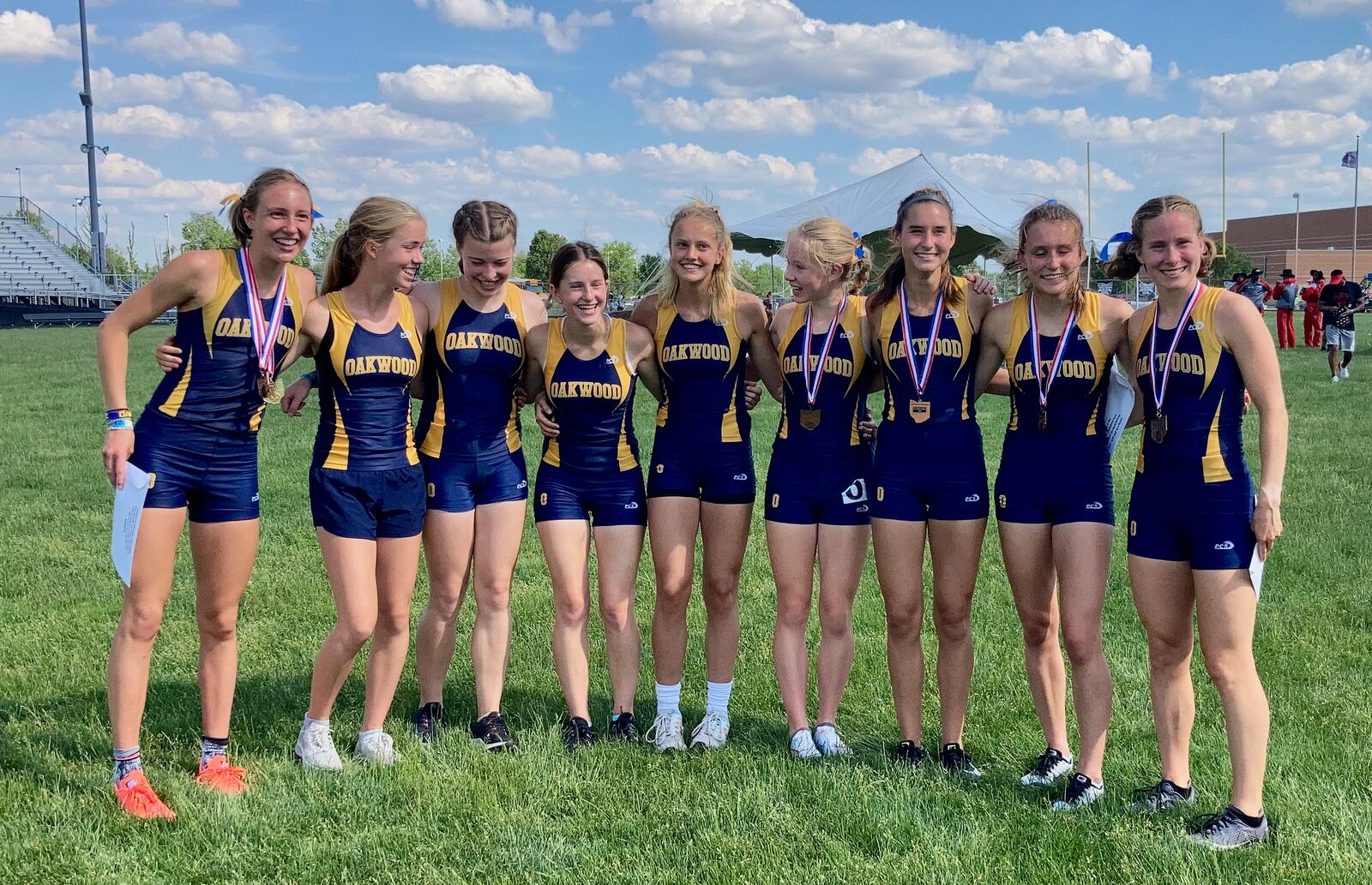 Oakwood poses for a photo after winning the Division II state track and field team championship on Saturday, June 5, 2021, at Pickerington North High School. David Jablonski/Staff