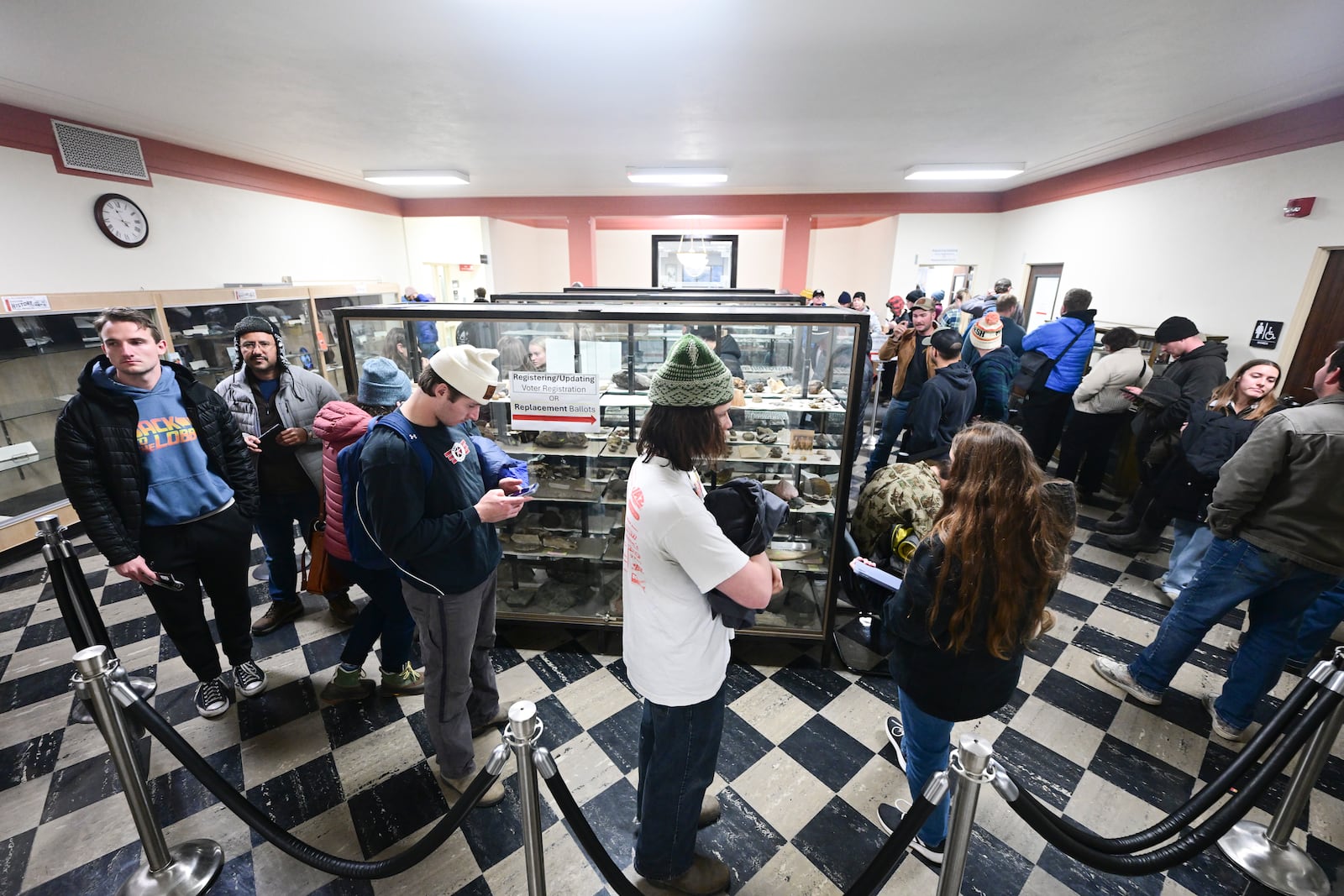 Voters line up inside the Gallatin County Courthouse in Bozeman, Mont., on Tuesday, Nov. 5, 2024. (AP Photo/Tommy Martino)