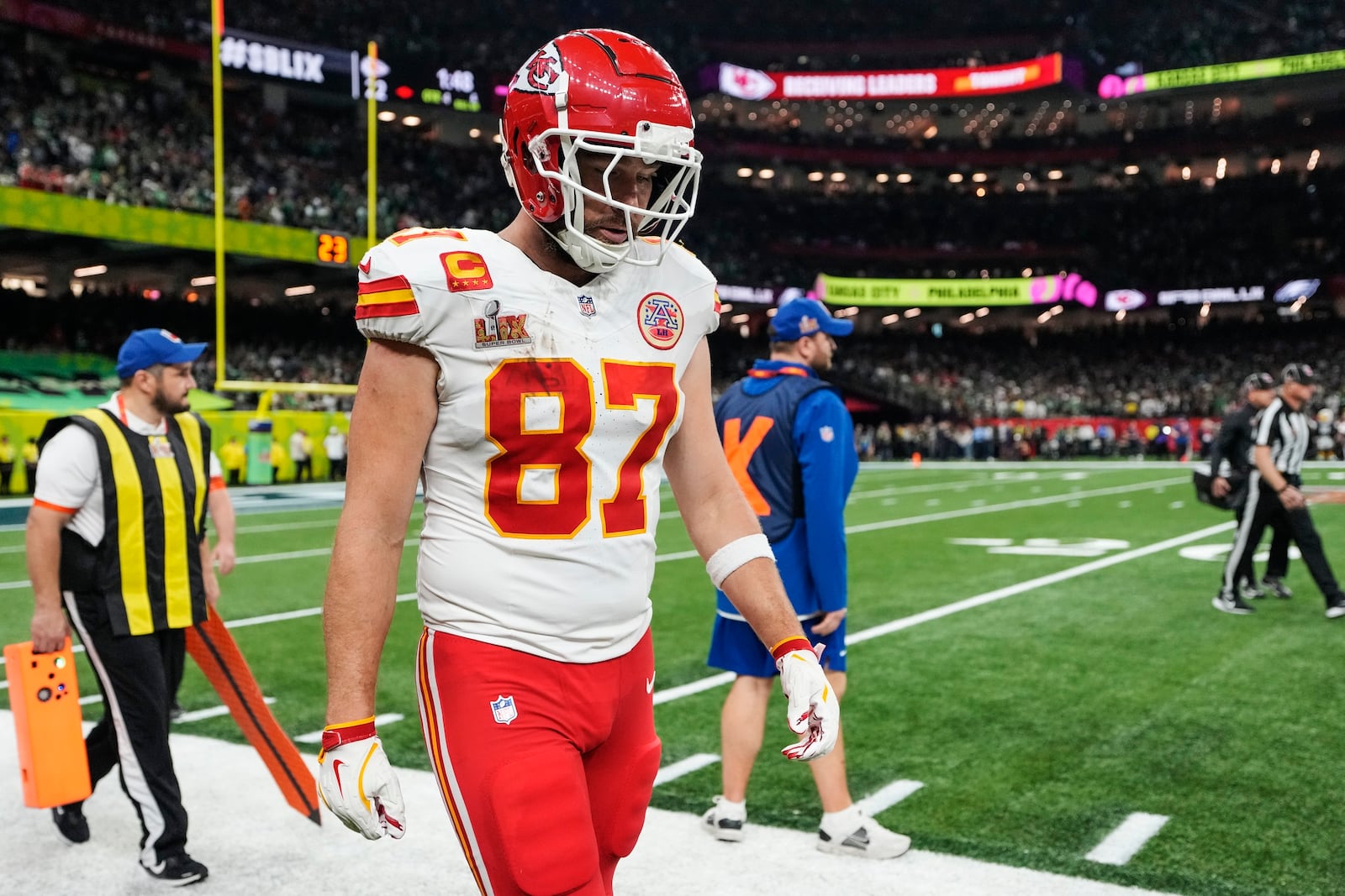 Kansas City Chiefs tight end Travis Kelce (87) walks to the bench during the second half of the NFL Super Bowl 59 football game against the Philadelphia Eagles, Sunday, Feb. 9, 2025, in New Orleans. (AP Photo/Ashley Landis)