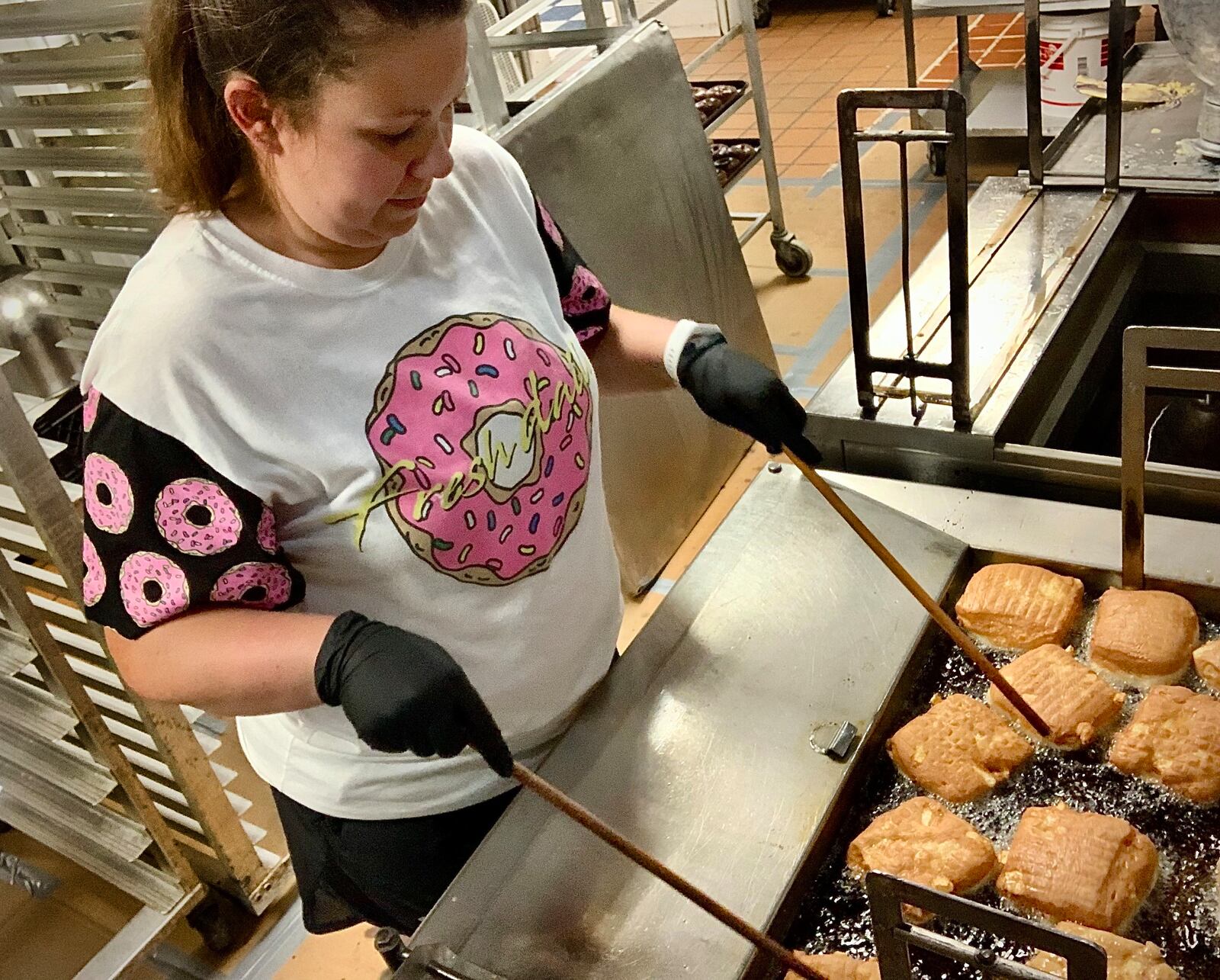 Lindsey Roberts, one of the owners of Stan the Donut Man, was busy Thursday, June 6, 2024 preparing for Natioal Donut Day, Friday, June 7, 2024. MARSHALL GORBY\STAFF