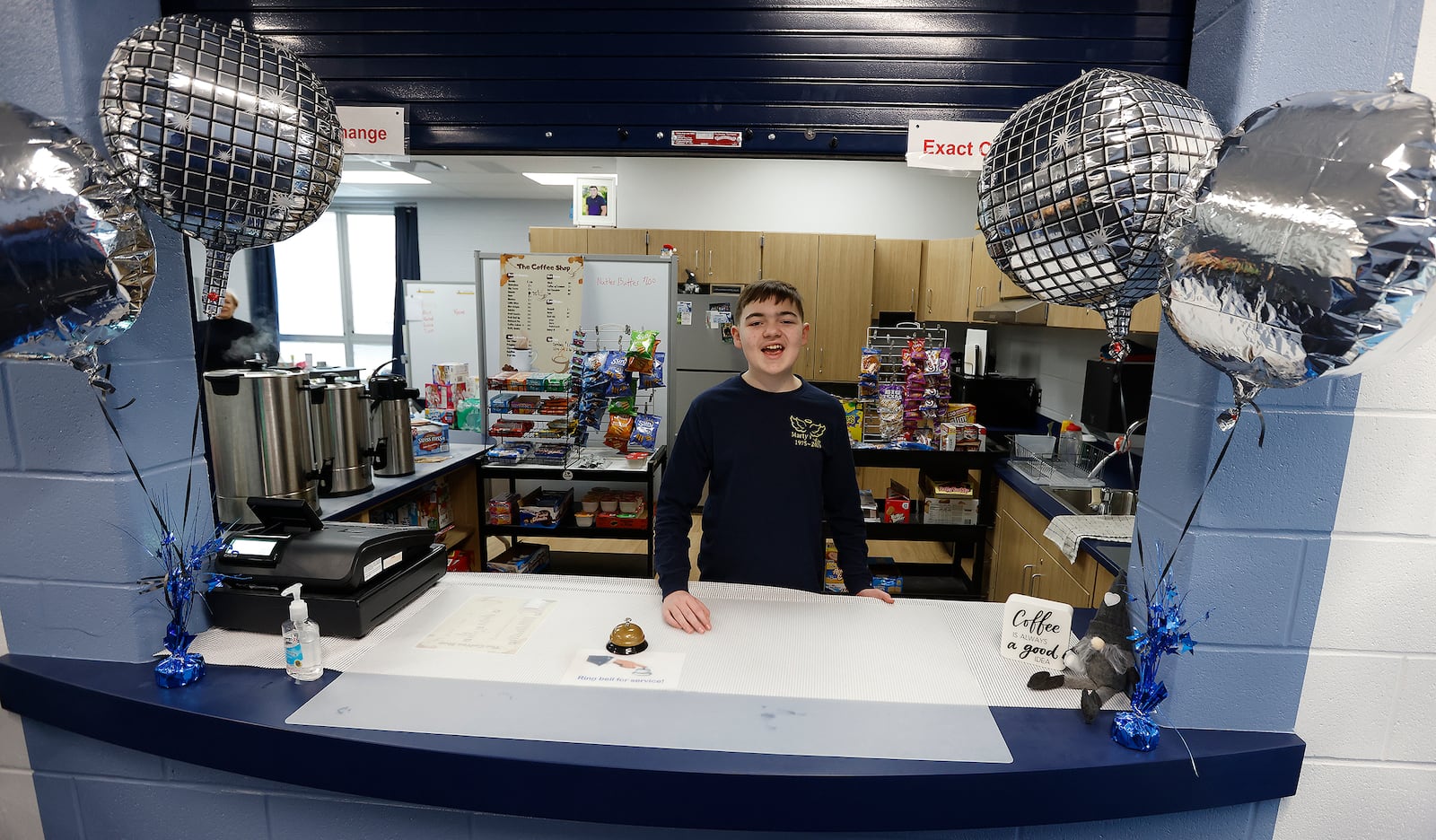 Jeffrey Profitt works in the cafe at the new Valley View High School. The special education department runs the cafe and pays special ed students to work there. It's a way for students to gain job skills and interact with other students and teachers. MARSHALL GORBY\STAFF