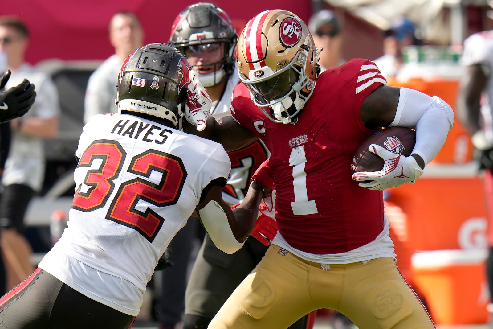 San Francisco 49ers wide receiver Deebo Samuel Sr. (1) runs against Tampa Bay Buccaneers safety Josh Hayes (32) during the second half of an NFL football game in Tampa, Fla., Sunday, Nov. 10, 2024. (AP Photo/Chris O'Meara)