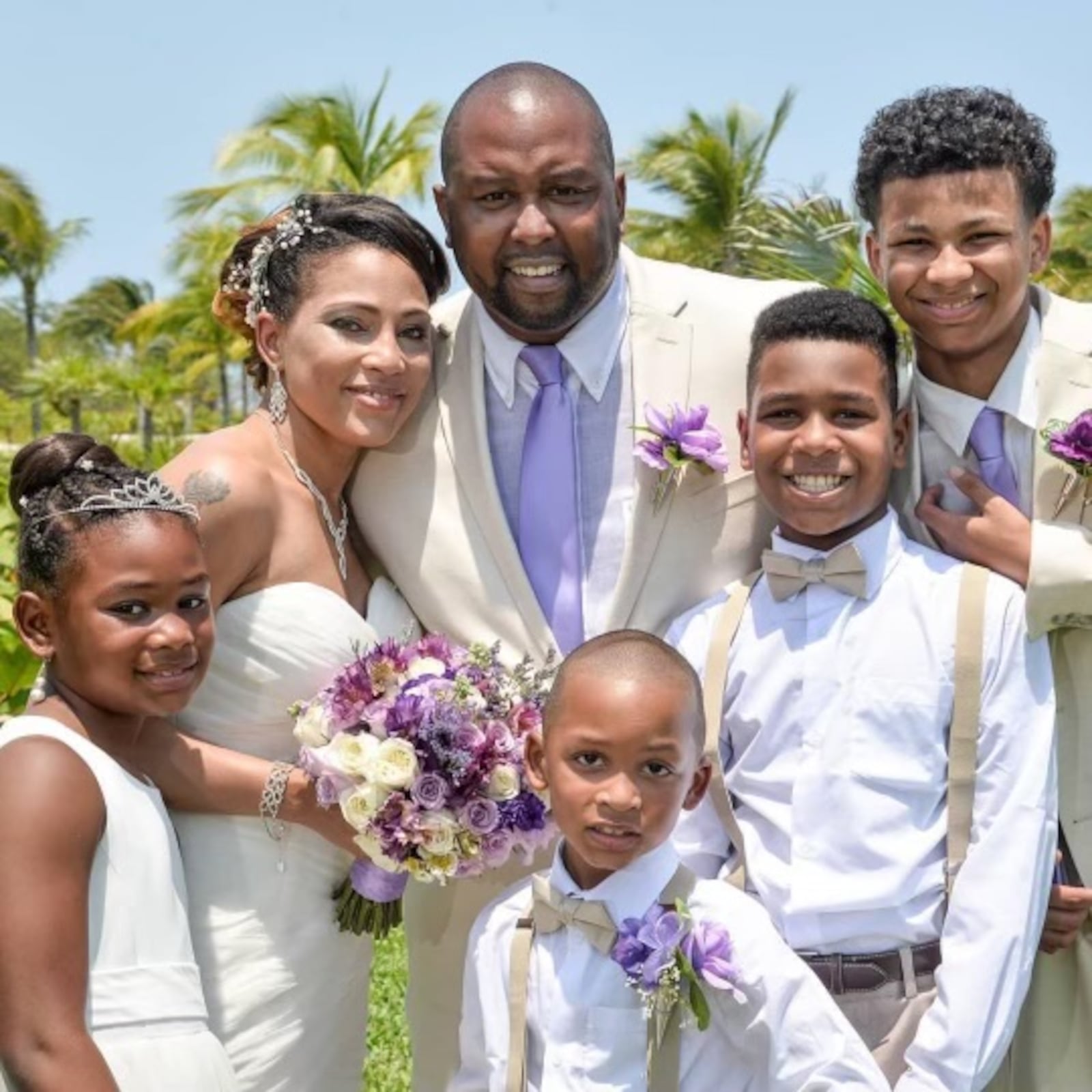 Former Dayton Flyers guard David Morris and family (left to right): daughter Nevaeh; wife Robyn; and sons Darius, Michael and Amari.