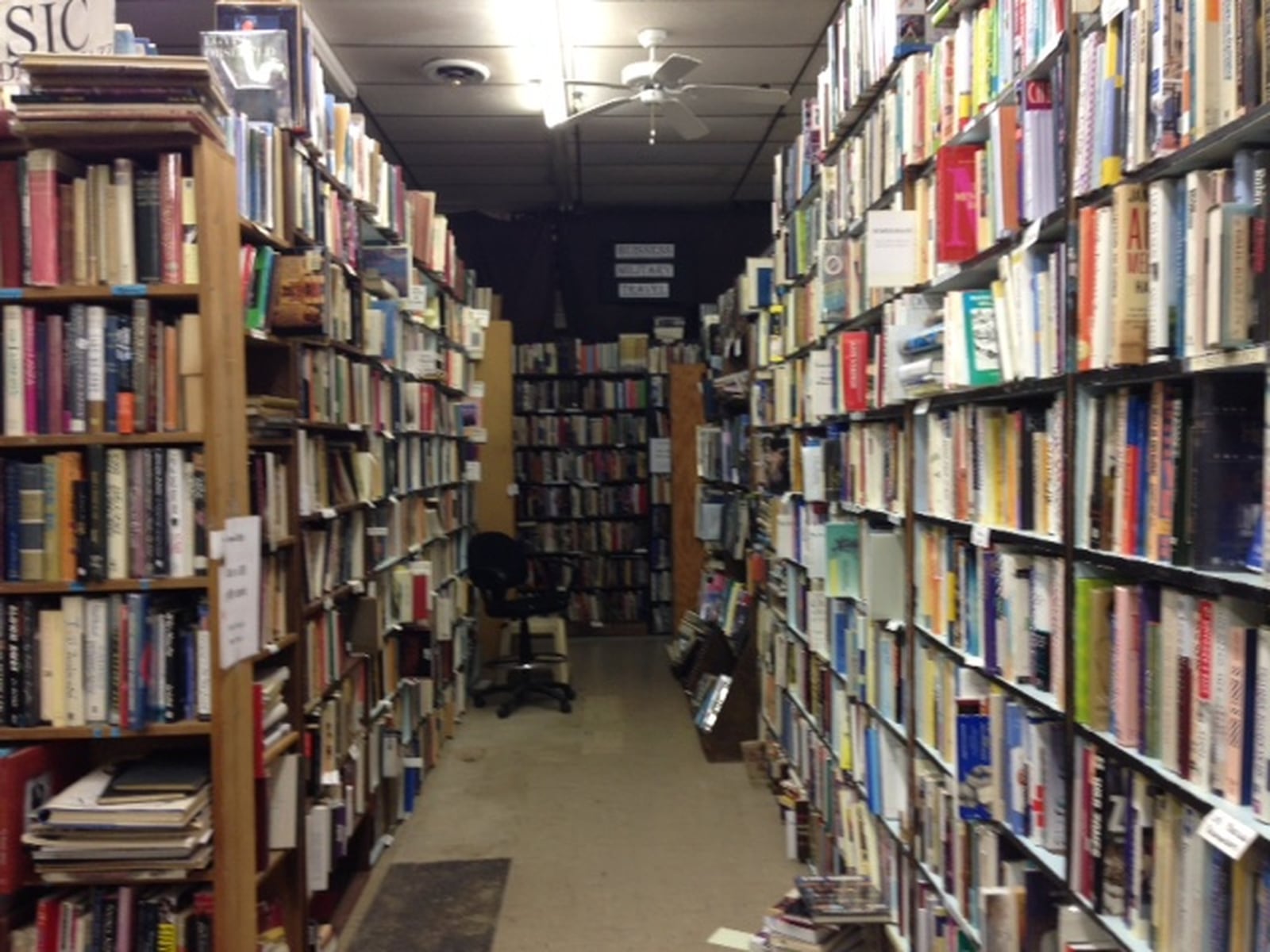 Managers at Dark Star Books in Yellow Springs have made changes in the product mix. But the mainstay remains: Used and vintage books and comics. Stacks of them, in fact. THOMAS GNAU/STAFF