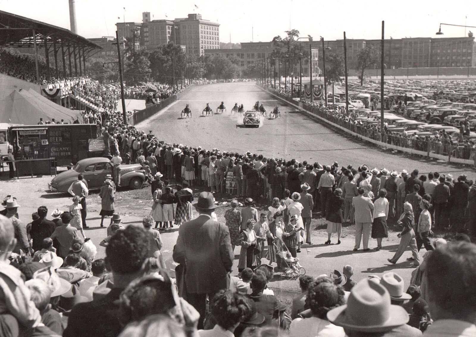 A crowd watches the start of a harness race at the 1950 Montgomery County Fair. DAYTON DAILY NEWS ARCHIVE