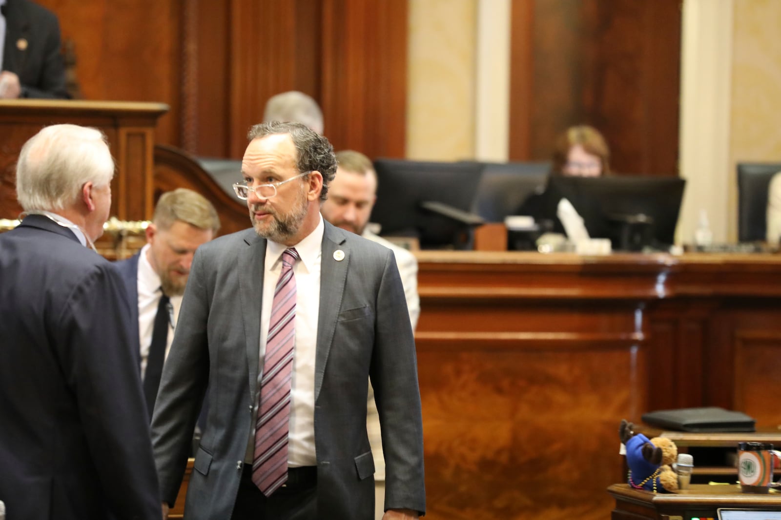 South Carolina House Ways and Means Chairman Bruce Bannister, R-Greenville, speaks to another member during the House budget debate on Tuesday, March 11, 2025, in Columbia, S.C. (AP Photo/Jeffrey Collins)