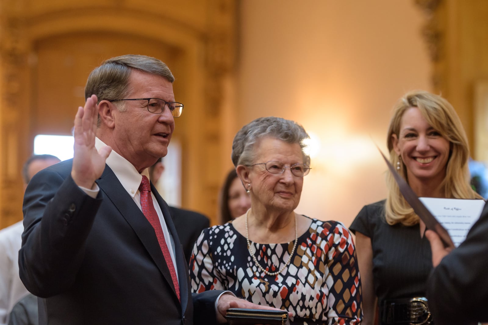 Steve Wilson, at left, being sworn in after his appointment to the Ohio Senate.