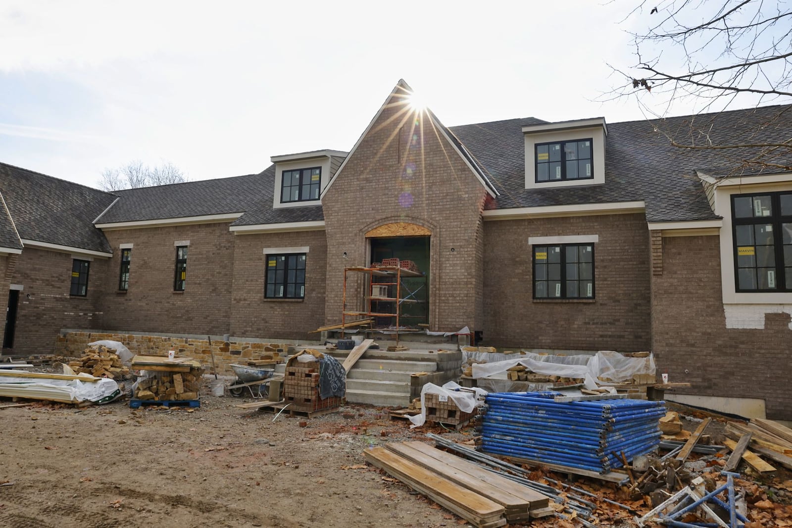 A home under construction in the 6400 block of Bull Run Court in Clearcreek Twp. Friday, Nov. 24, 2023. The average home sales prices in the Dayton region continued to increase year-to-date through October when compared to 2022 and local experts say the primary cause is a lack of inventory. NICK GRAHAM/STAFF