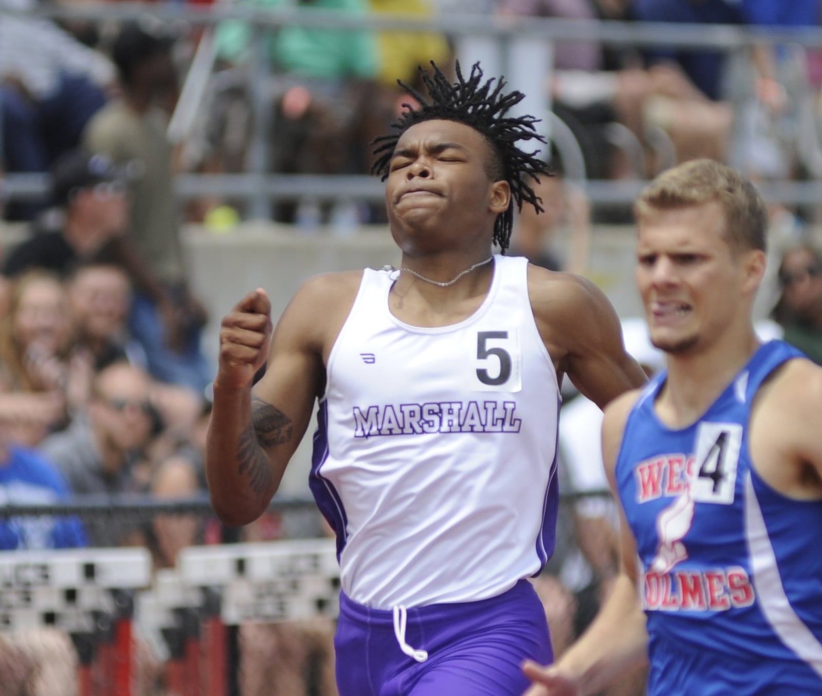 Thurgood Marshall senior J.J. Zachery (left) won the D-II 400 during the state track and field meets at OSU’s Jesse Owens Memorial Stadium in Columbus on Saturday, June 2, 2018. MARC PENDLETON / STAFF