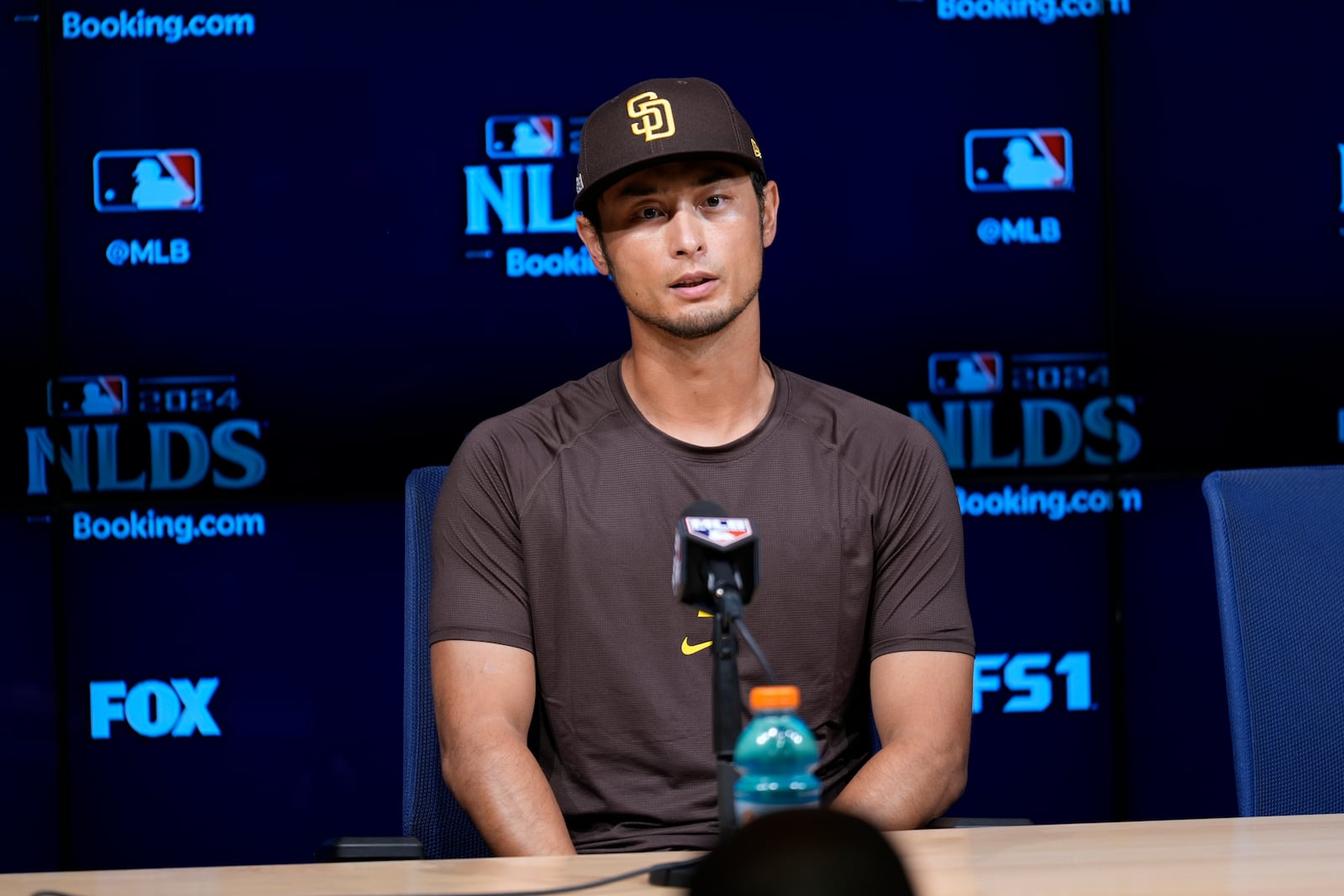 San Diego Padres pitcher Yu Darvish fields questions ahead of Game 5 of a baseball National League Division Series against the Los Angeles Dodgers, Thursday, Oct. 10, 2024, in Los Angeles. (AP Photo/Ashley Landis)