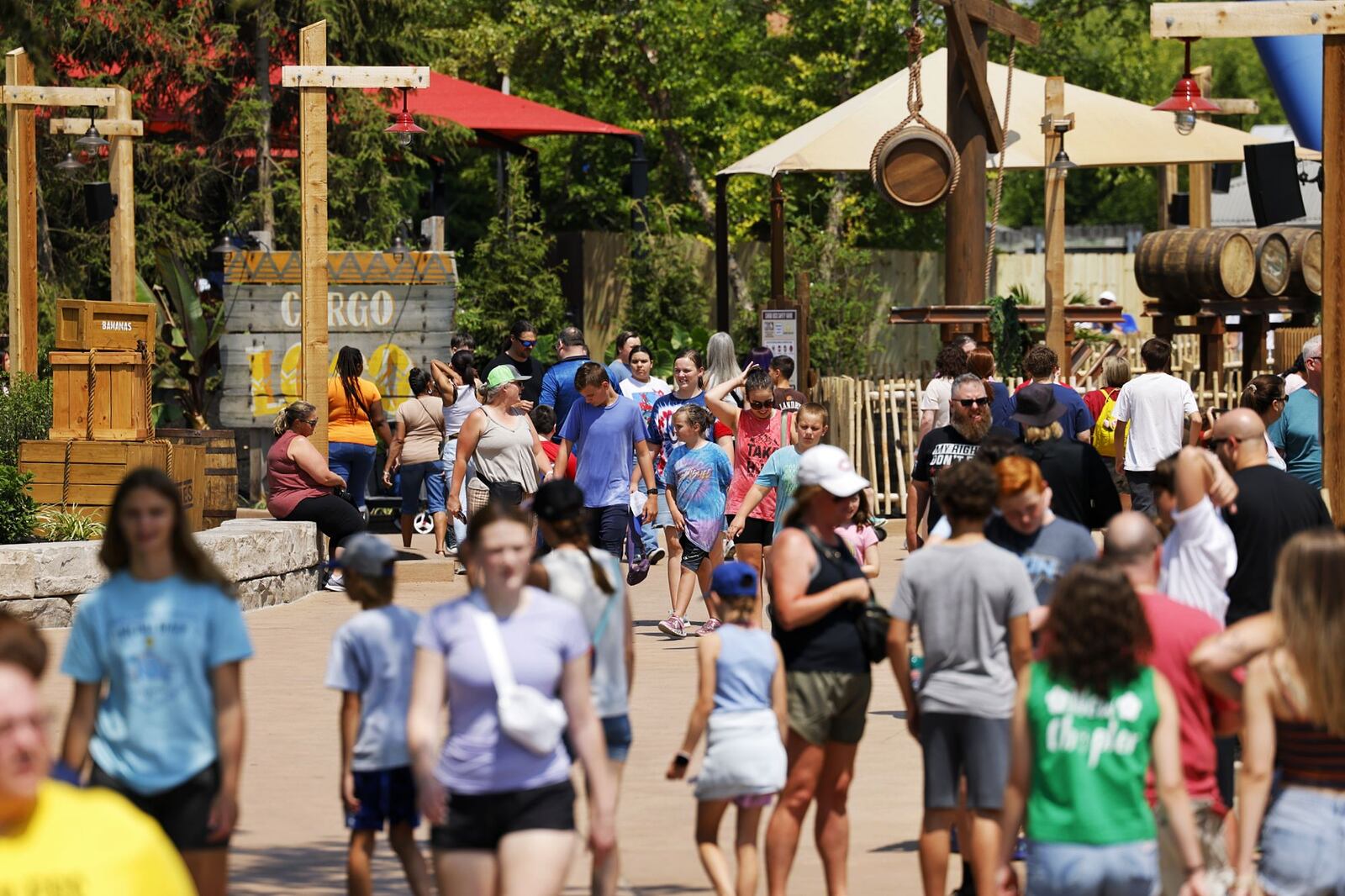 Kings Island visitors got to experience the newest themed area "Adventure Port" before the official opening day Friday, June 9, 2023 in Mason. The area features Enrique's Restaurant and Mercados Patio Bar, Adventure Express coaster and two new rides, Sol Spin and Cargo Loco. NICK GRAHAM/STAFF