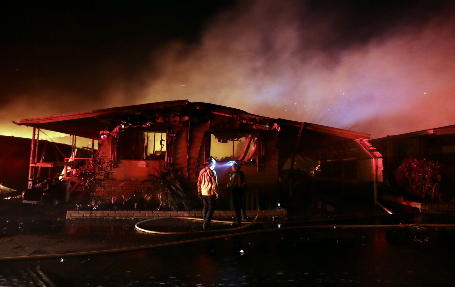 Photos: California wildfires burn thousands of acres, force evacuations