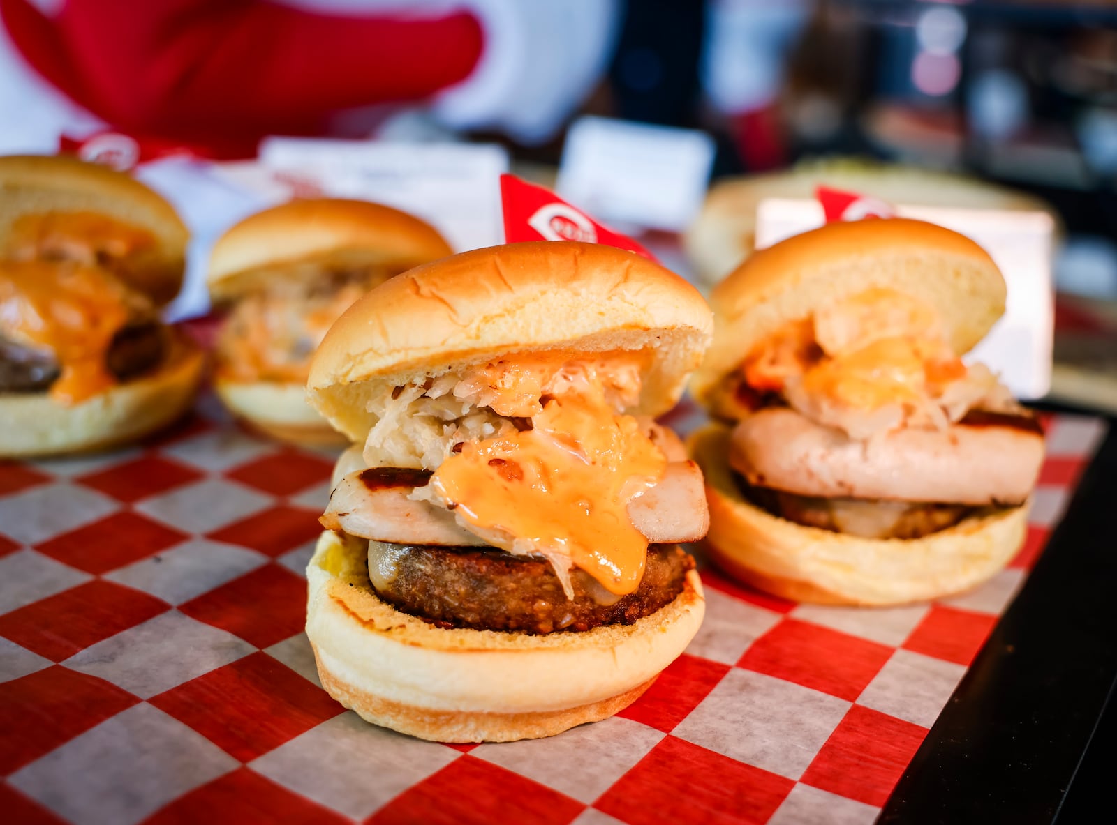 The Cincinnati Reds announced new menu items ahead of opening day on Friday, March 21, 2025 in The Handlebar at the Riverfront Club inside Great American Ball Park in Cincinnati. Executive Chef Gary Davis created a variety of new dishes for the upcoming season. This is the Glier's Goetta Reuben Sliders and Reds Double Decker Glier's Goetta Sluggers. NICK GRAHAM/STAFF