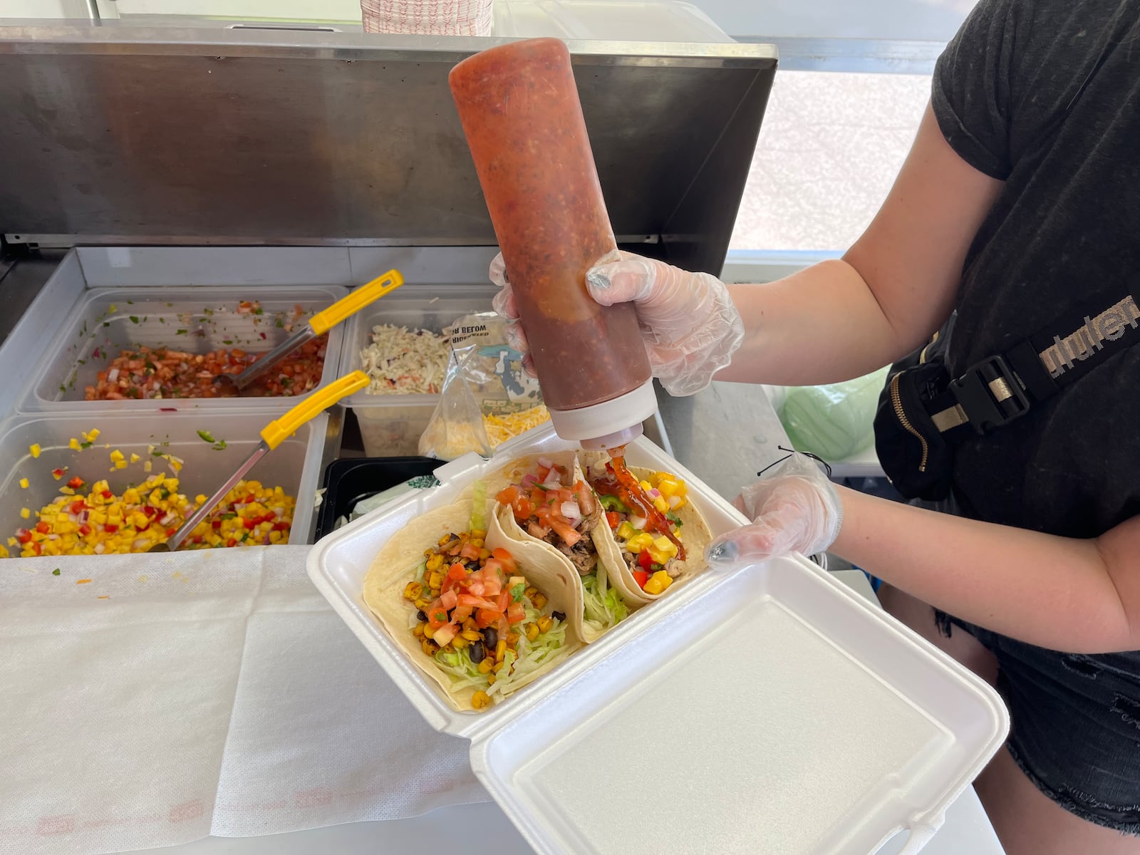 Dayton Daily News Reporter Natalie Jones gains food truck experience with Cory Thompson, the owner of What The Taco?!