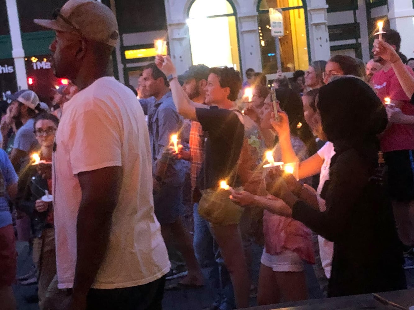 PHOTOS: Candlelight vigil in Dayton after shooting