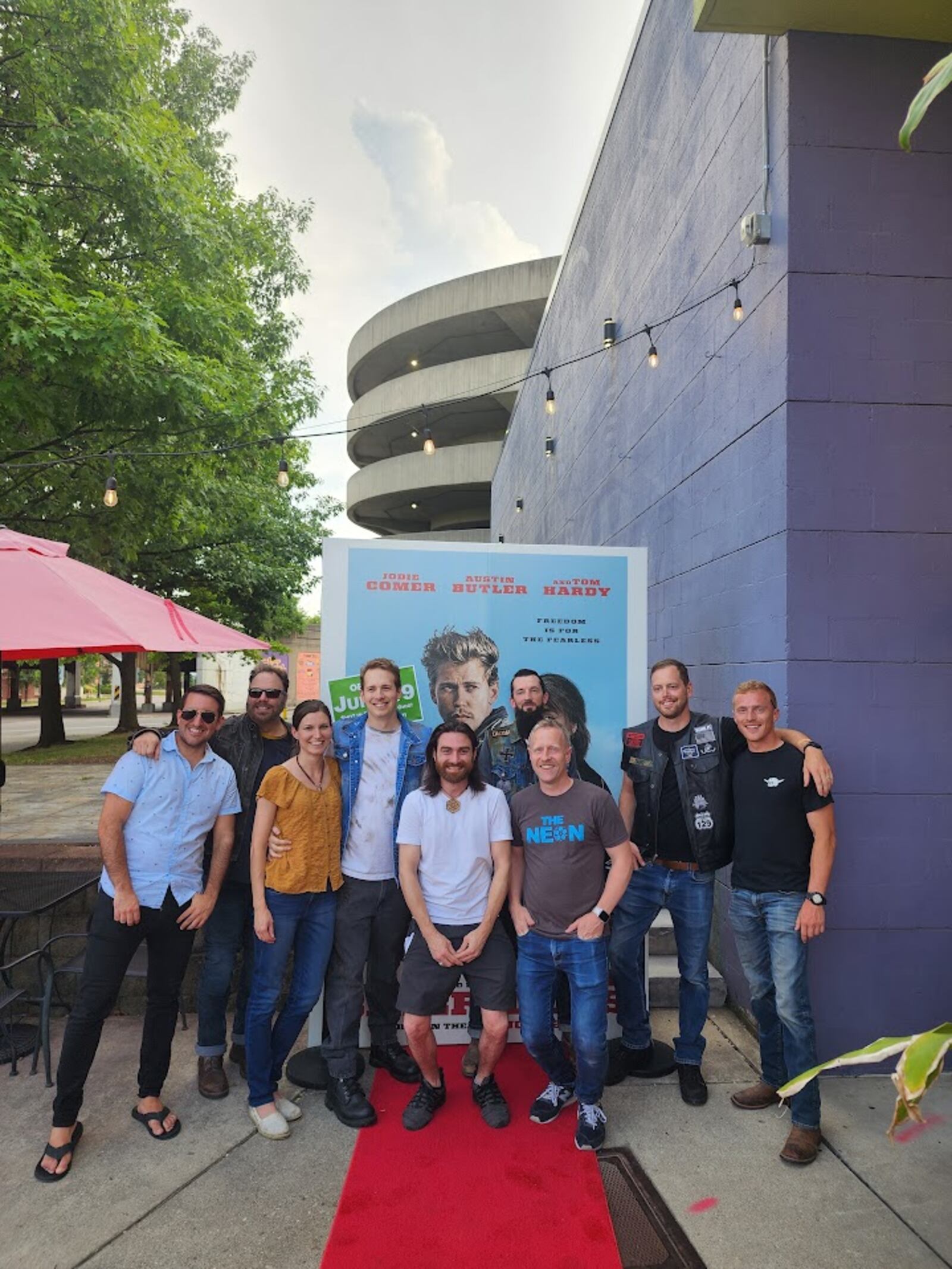 Left to right: Sammy Geroulis, Lee Laney, Stacy Volpenhein, Matt Volpenhein, Michael Blackwell, Joe Muddiman, Jonathan McNeal, Clark Sabo, and Nick Schweiss at the June 19 area premiere of "The Bikeriders" at The Neon. CONTRIBUTED