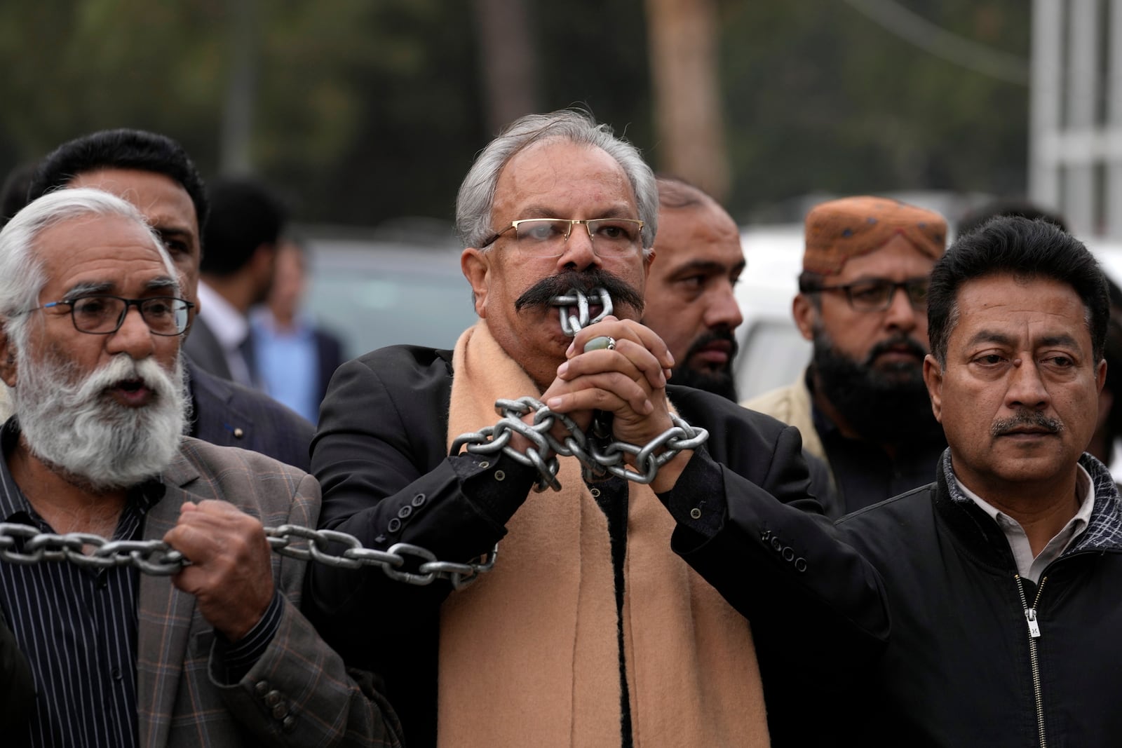 Journalists take part in a protest rally in Islamabad, Pakistan, Tuesday, Jan. 28, 2025, to condemn a controversial 'Prevention of Electronic Crimes Act' bill passed by parliament that critics argue is designed to suppress freedom of speech. (AP Photo/Anjum Naveed)