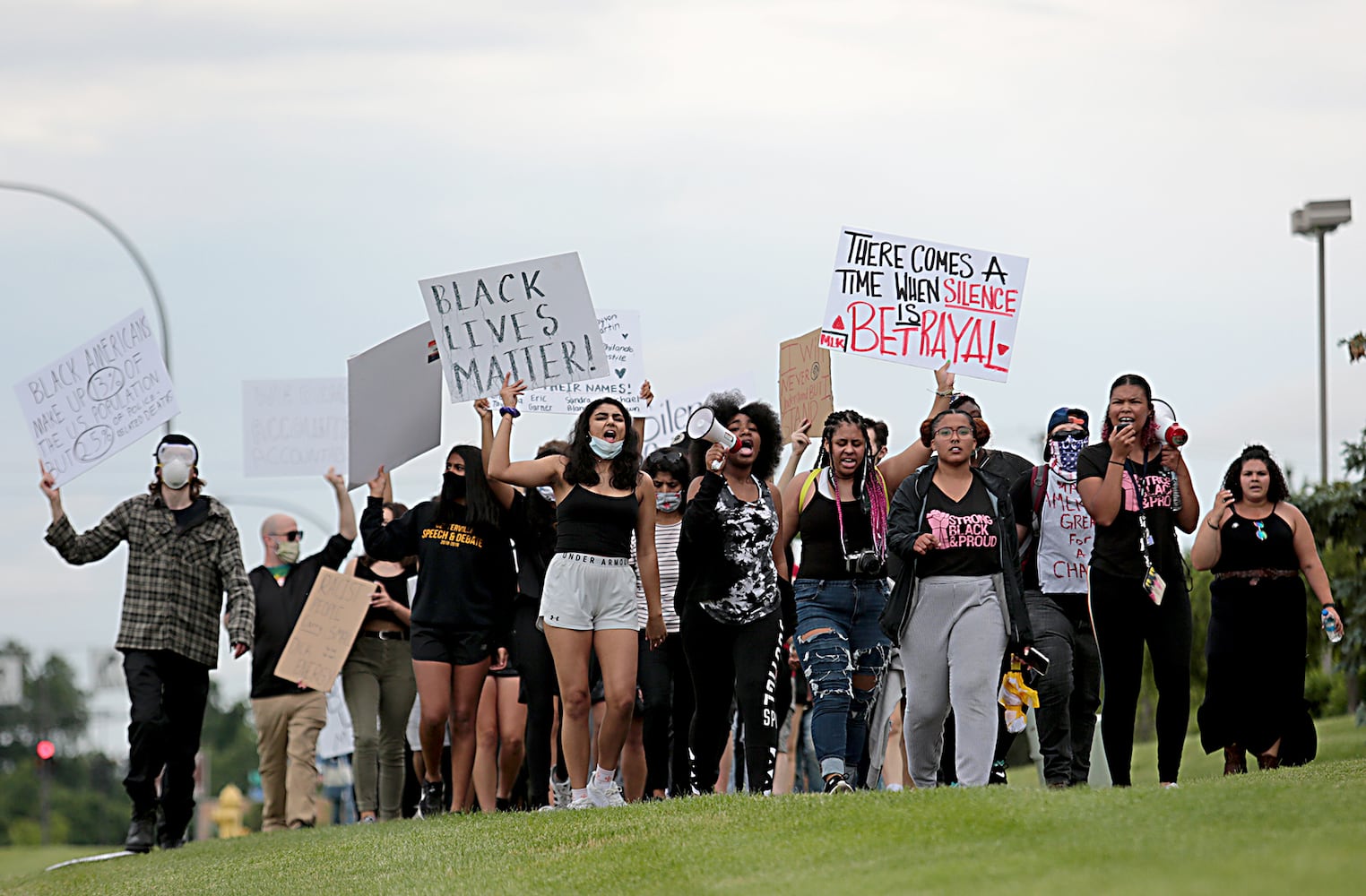 PHOTOS: Demonstrators rally for justice in Beavercreek