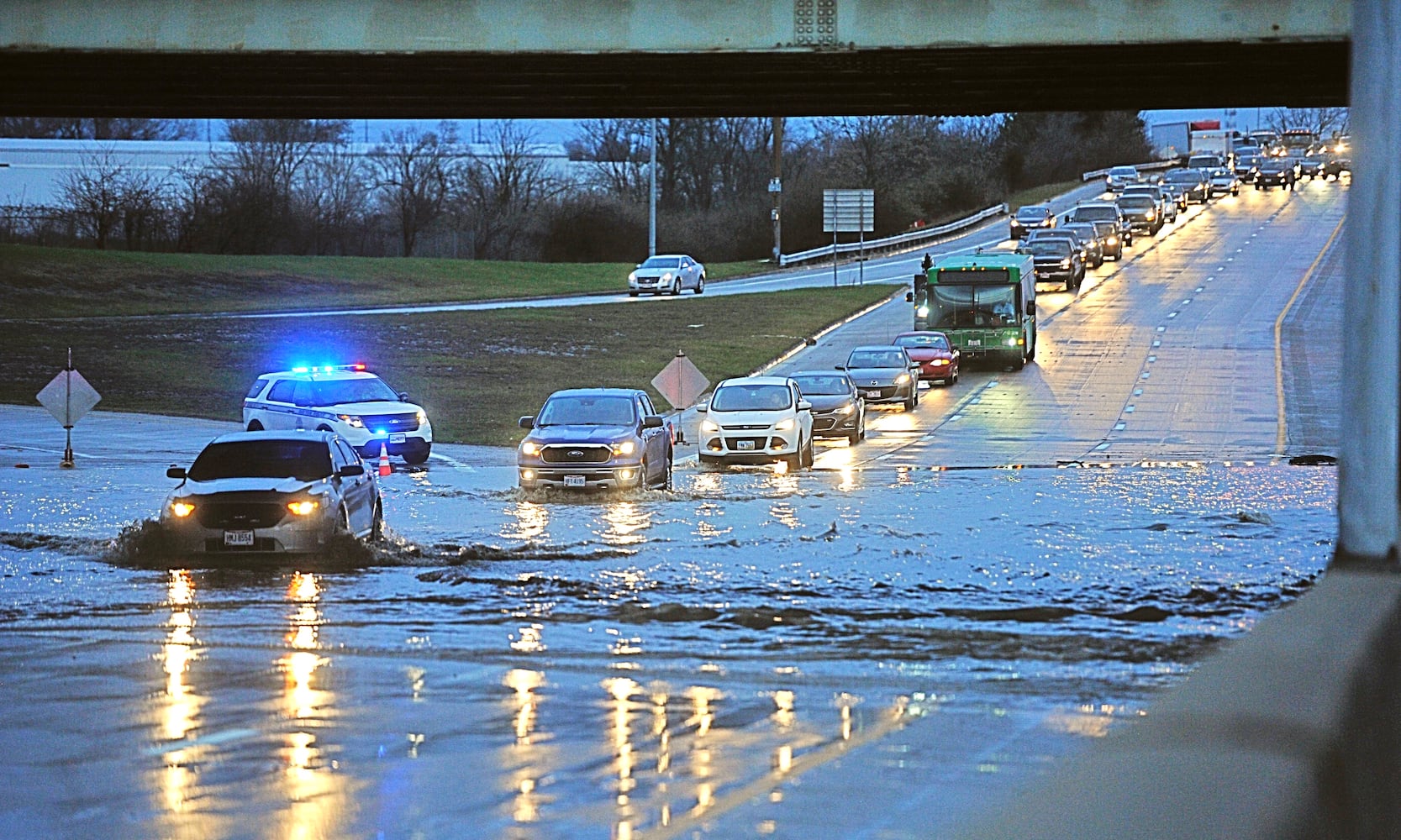 PHOTOS: Storms cause flooding, damage on first day of spring