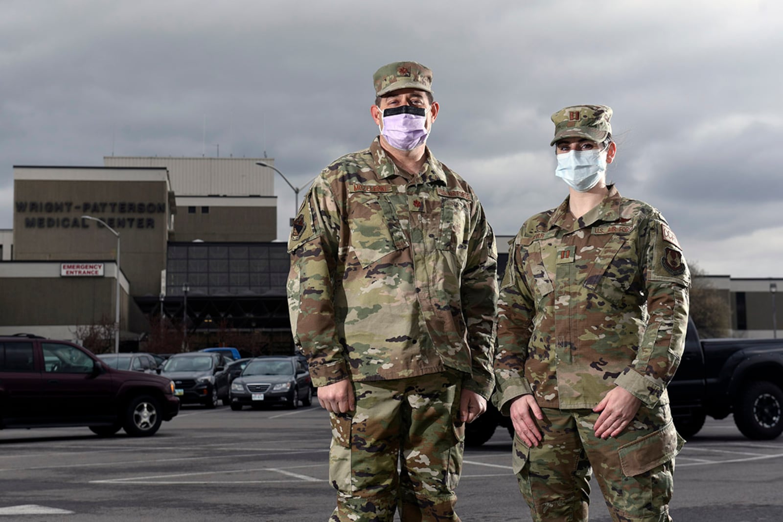 Dr. (Maj.) Eric Mozeleski (left) and Capt. Carly Kerr, a critical-care nurse, became first responders March 23 when they attended to victims of a rollover crash on I-675 in Beavercreek as they commuted to work at Wright-Patterson Medical Center. The two 88th Medical Group officers stabilized two people and waited for emergency services to arrive. U.S. AIR FORCE PHOTO/TY GREENLEES