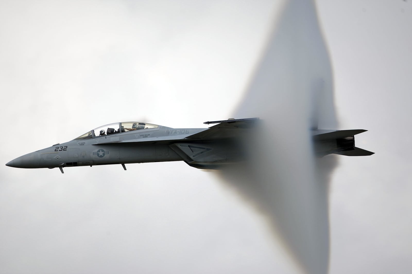 An F/A-18F Super Hornet throws a vapor cloud as it approaches the speed of sound during a rehearsal flight for a past Vectren Dayton Air Show. The F/A-18 Super Hornet, the similar E/A-18 Growler, and the F-35 Lighting II are among aircraft that pilots have reported ‘physiological episodes, including hypoxia-like incidents, in recent years. TY GREENLEES/ STAFF FILE PHOTO