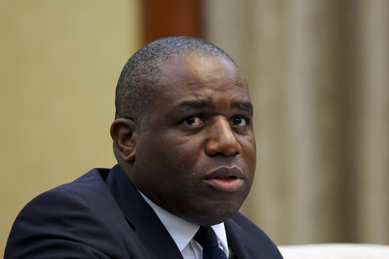 Britain's Foreign Secretary David Lammy attends a meeting with Chinese Vice Premier Ding Xuexiang at the Great Hall of the People in Beijing, China, Friday, Oct. 18, 2024. (Florence Lo/Pool Photos via AP)