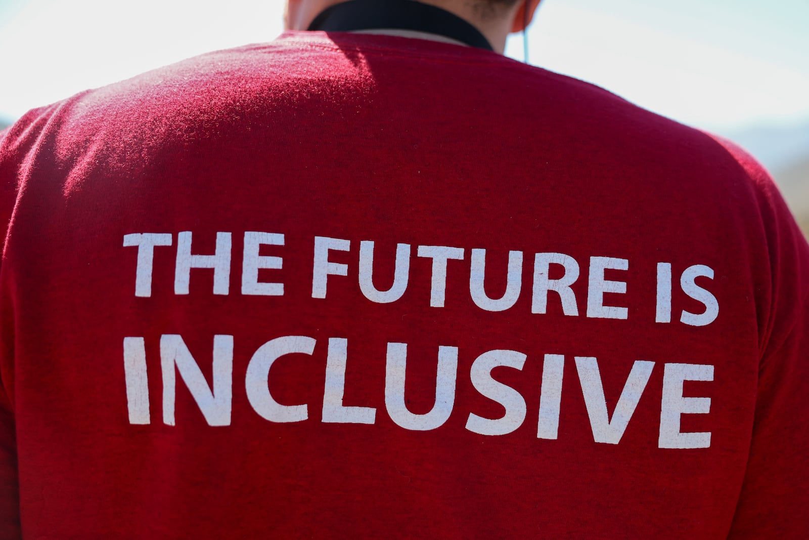 The shirt of Ian Castro, a doctoral candidate in geoscience education at the University of Cincinnati, is seen during an accessible field trip to the San Andreas Fault organized by the International Association of Geoscience Diversity Thursday, Sept. 26, 2024, in San Bernadino, Calif. (AP Photo/Ryan Sun)