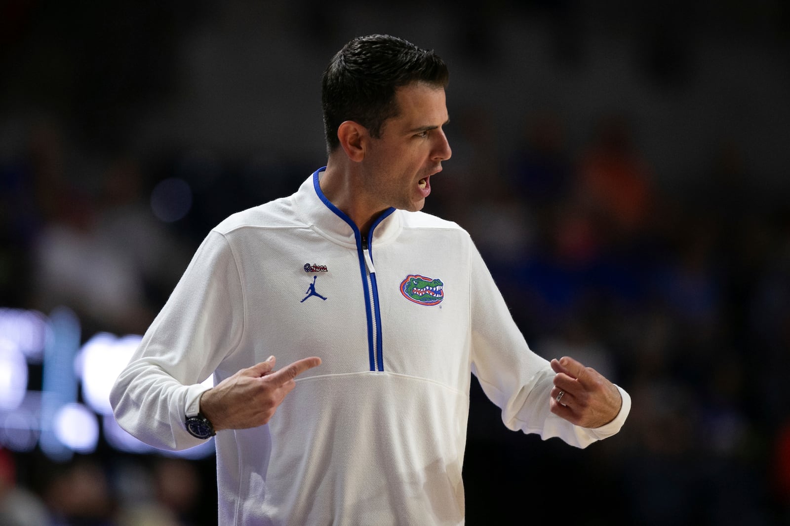 Florida head coach Todd Golden coaches during the first half of an NCAA college basketball game against Grambling State, Monday, Nov. 11, 2024, in Gainesville, Fla. (AP Photo/Alan Youngblood)