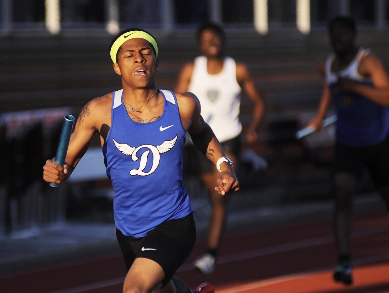 Dunbar anchor Zamir Youngblood wins the 800 relay during the Wayne Inv. on Friday, April 26, 2019. MARC PENDLETON / STAFF