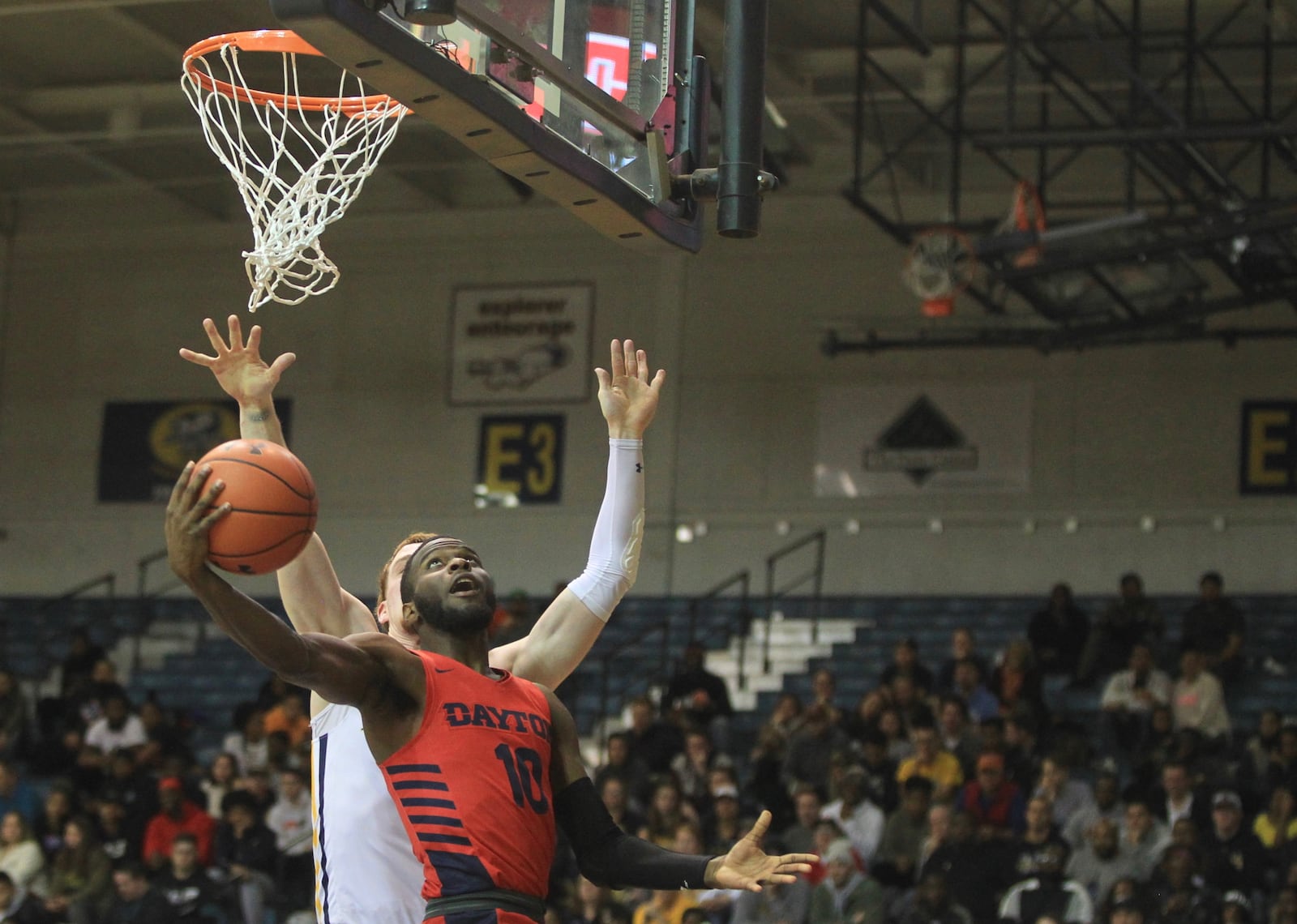 Dayton’s Jalen Crutcher scores against La Salle on Thursday, Jan. 2, 2019, at Tom Gola Arena in Philadelphia.