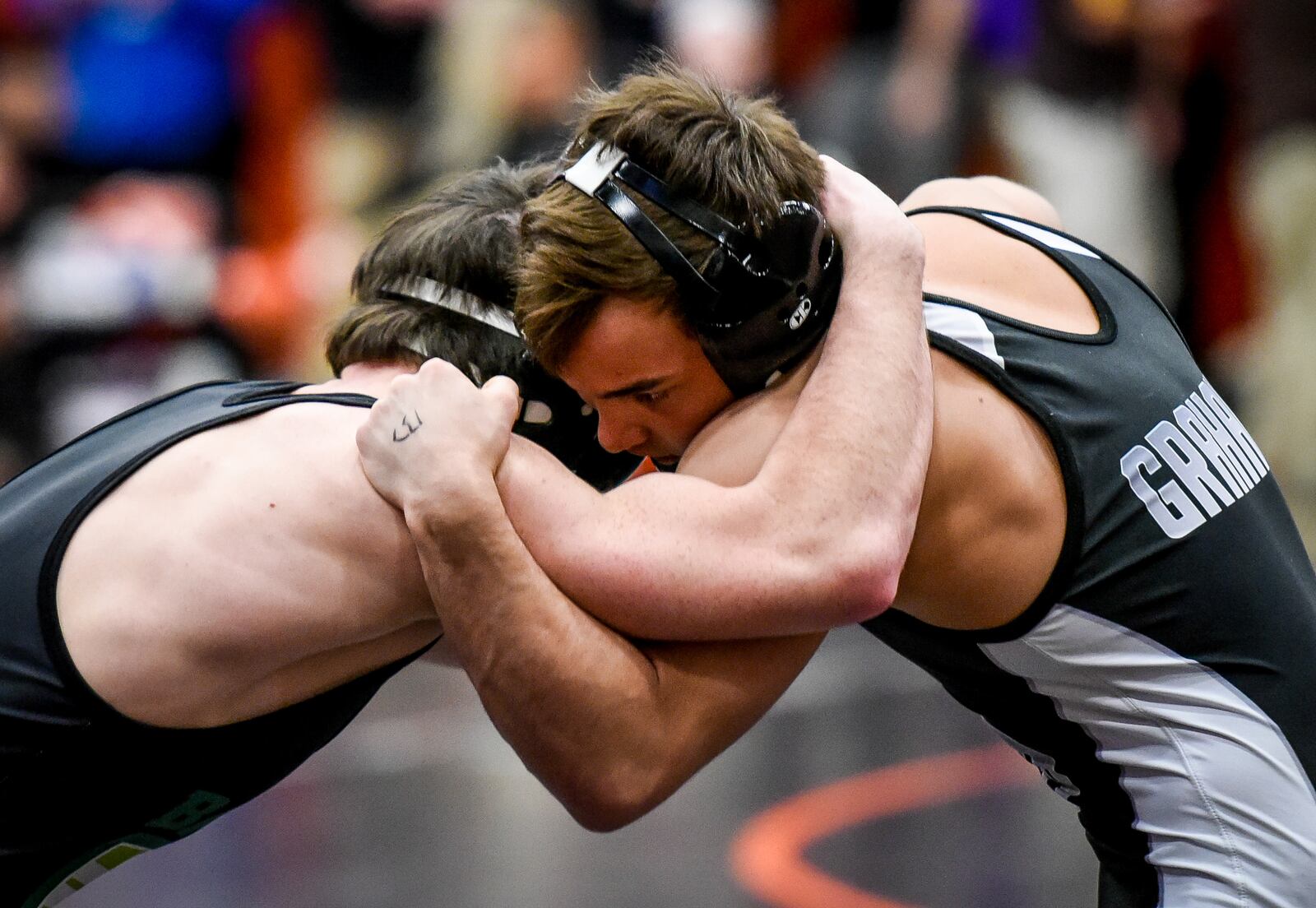 Graham’s Mitch Moore gets the win over Badin’s Kane Schmidt during their match in the 132-pound weight class at the Division II district wrestling tournament March 3 at Wilmington. NICK GRAHAM/STAFF