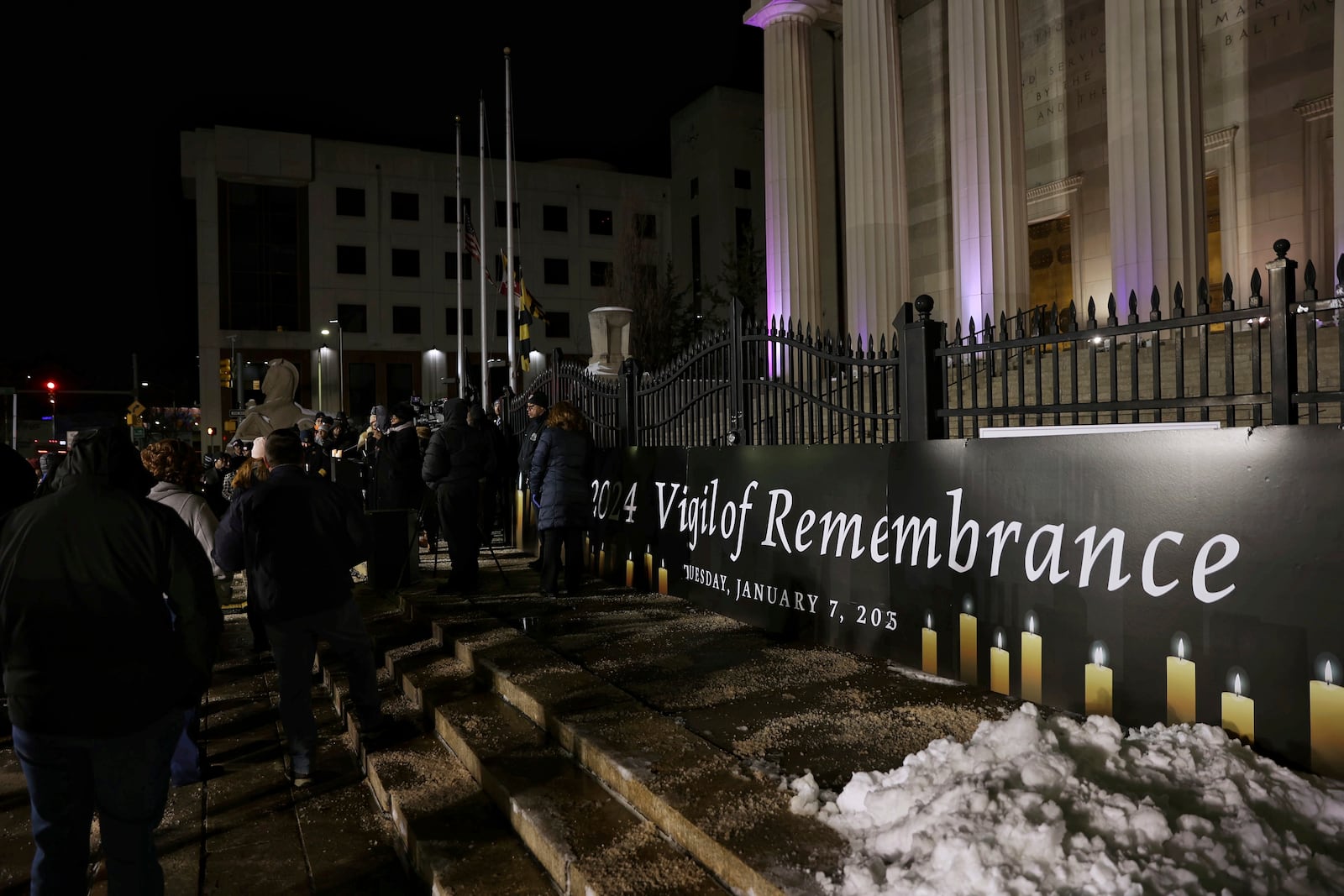 Baltimore Mayor Brandon Scott addresses attendees at the annual Vigil of Remembrance at War Memorial Plaza, Tuesday, Jan. 7, 2025, in Baltimore, Md., to honor the lives of Baltimoreans lost in 2024. (Wesley Lapointe/The Baltimore Banner via AP)