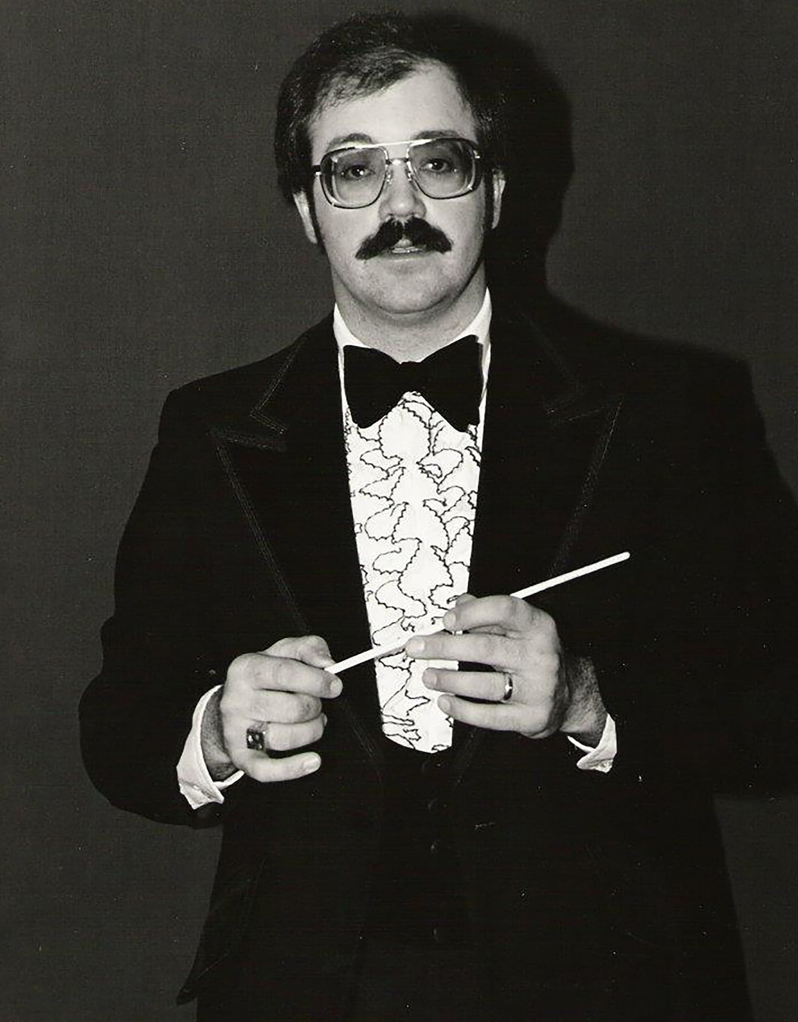 Trego as a band conductor in the 1983.