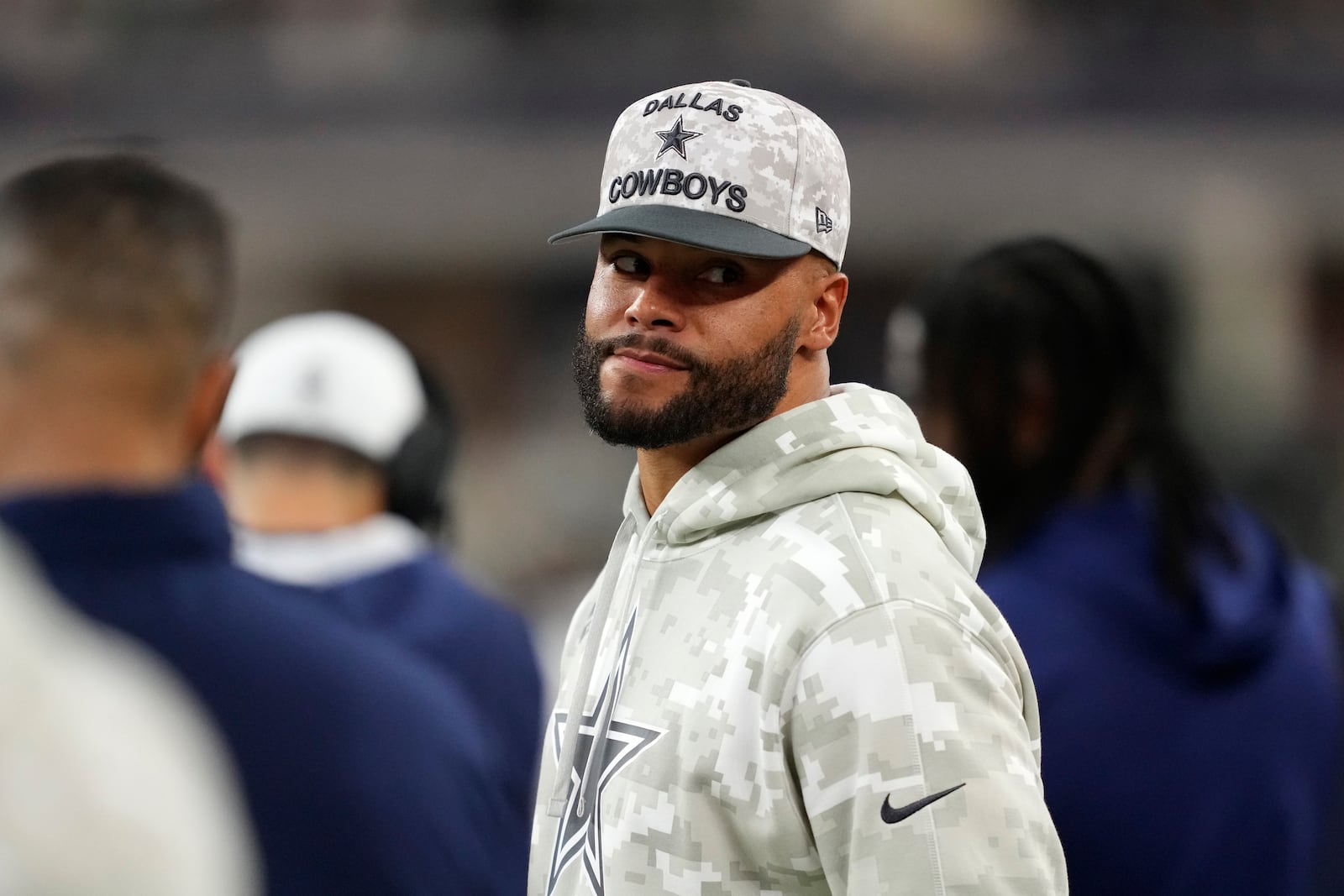 Dallas Cowboys quarterback Dak Prescott watches play against the Philadelphia Eagles in the second half of an NFL football game in Arlington, Texas, Sunday, Nov. 10, 2024. (AP Photo/Jeffrey McWhorter)