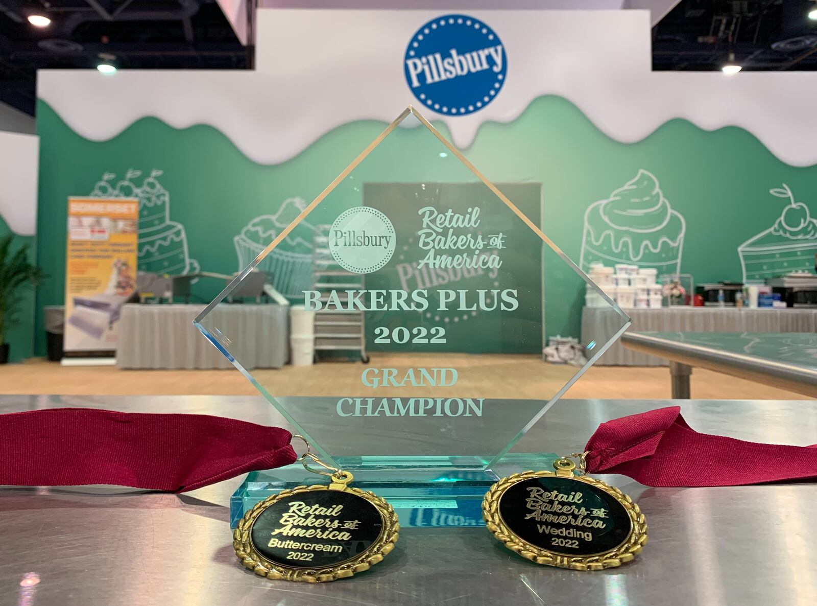 Two Dorothy Lane Market (DLM) cake designers competed in an international, multi-day competition and came out on top as the grand champion.