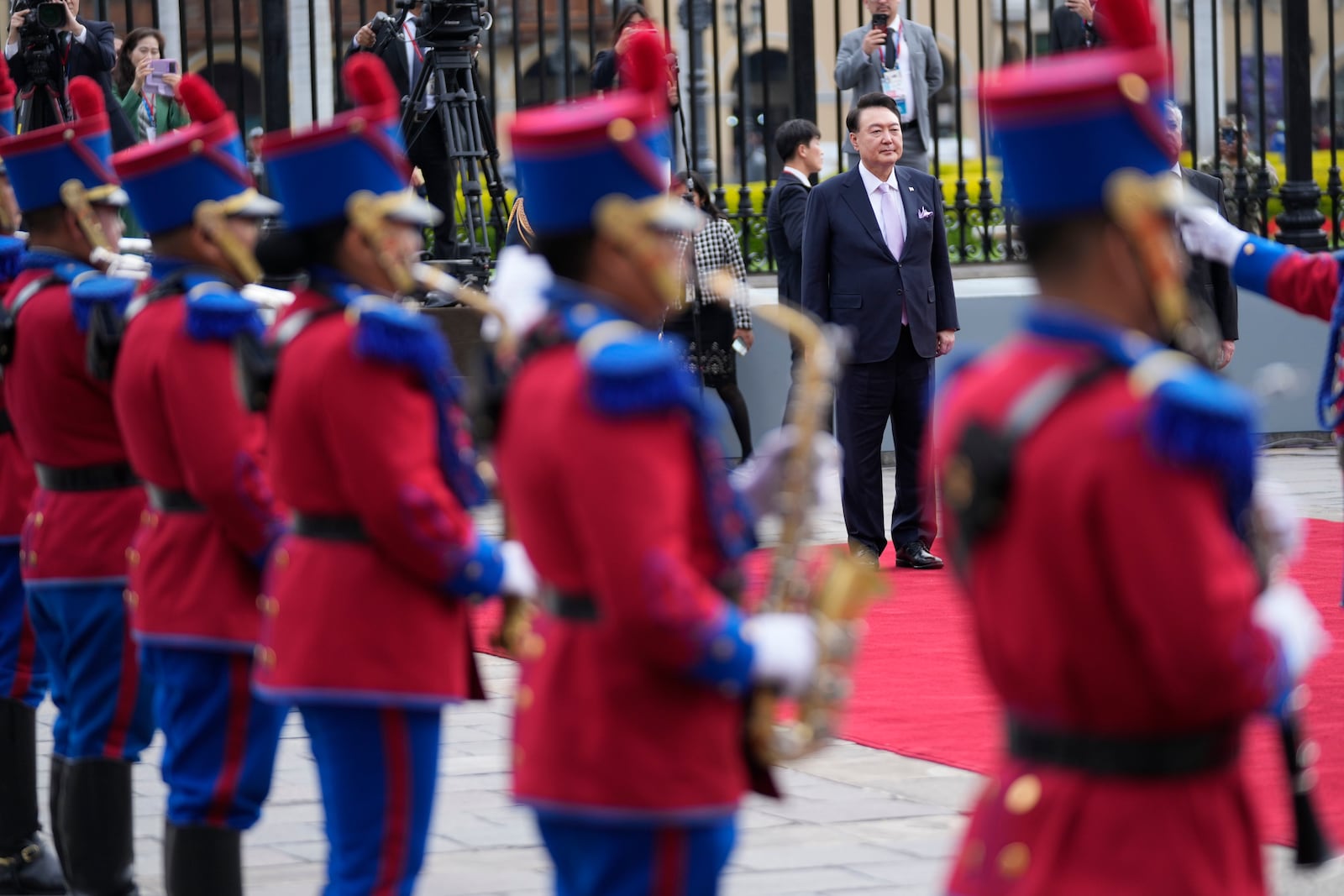 South Korea's President Yoon Suk Yeol arrives for a welcoming ceremony at the government palace in Lima, Peru, Saturday, Nov. 16, 2024, following the closing of the Asia-Pacific Economic Cooperation (APEC) summit. (AP Photo/Fernando Vergara)