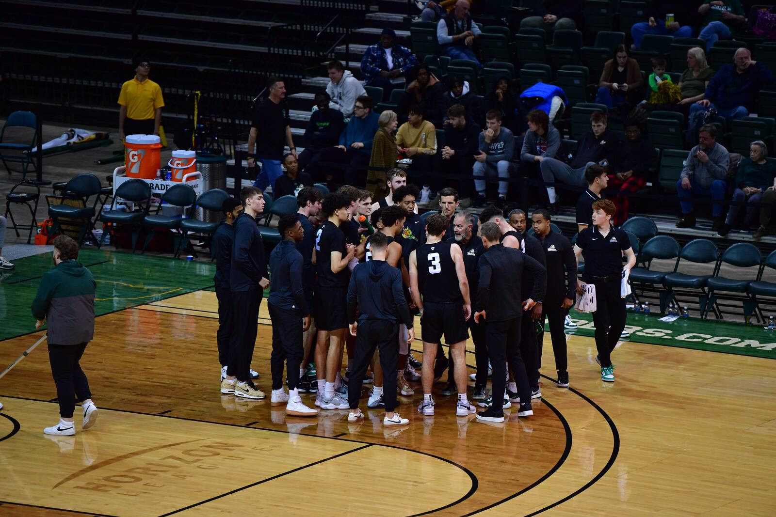 Wright State huddles around head coach Scott Nagy during Tuesday night's game vs. Western Kentucky at the Nutter Center. Wright State Athletics photo