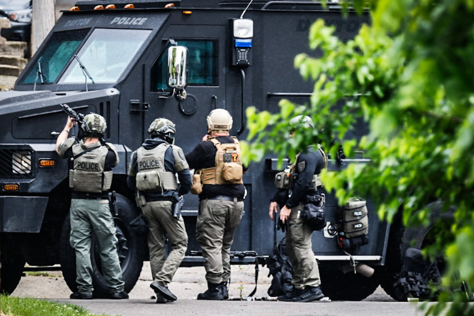 SWAT crew members were outside a house in Dayton on King Avenue s early Wedesday afternoon on May 15, 2024. JIM NOELKER\STAFF