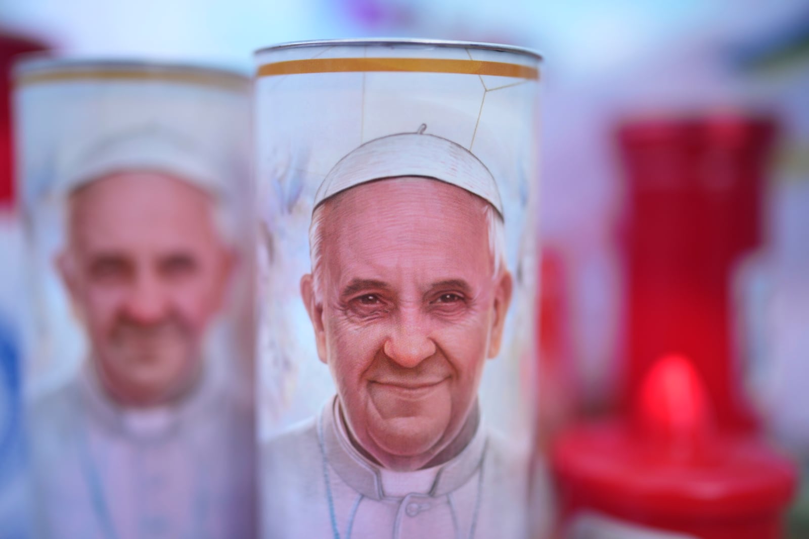 Candles for Pope Francis are seen at the Agostino Gemelli Polyclinic, in Rome, Friday, Feb. 28, 2025 where Pope Francis has been hospitalized since Friday, Feb. 14. (AP Photo/Alessandra Tarantino)