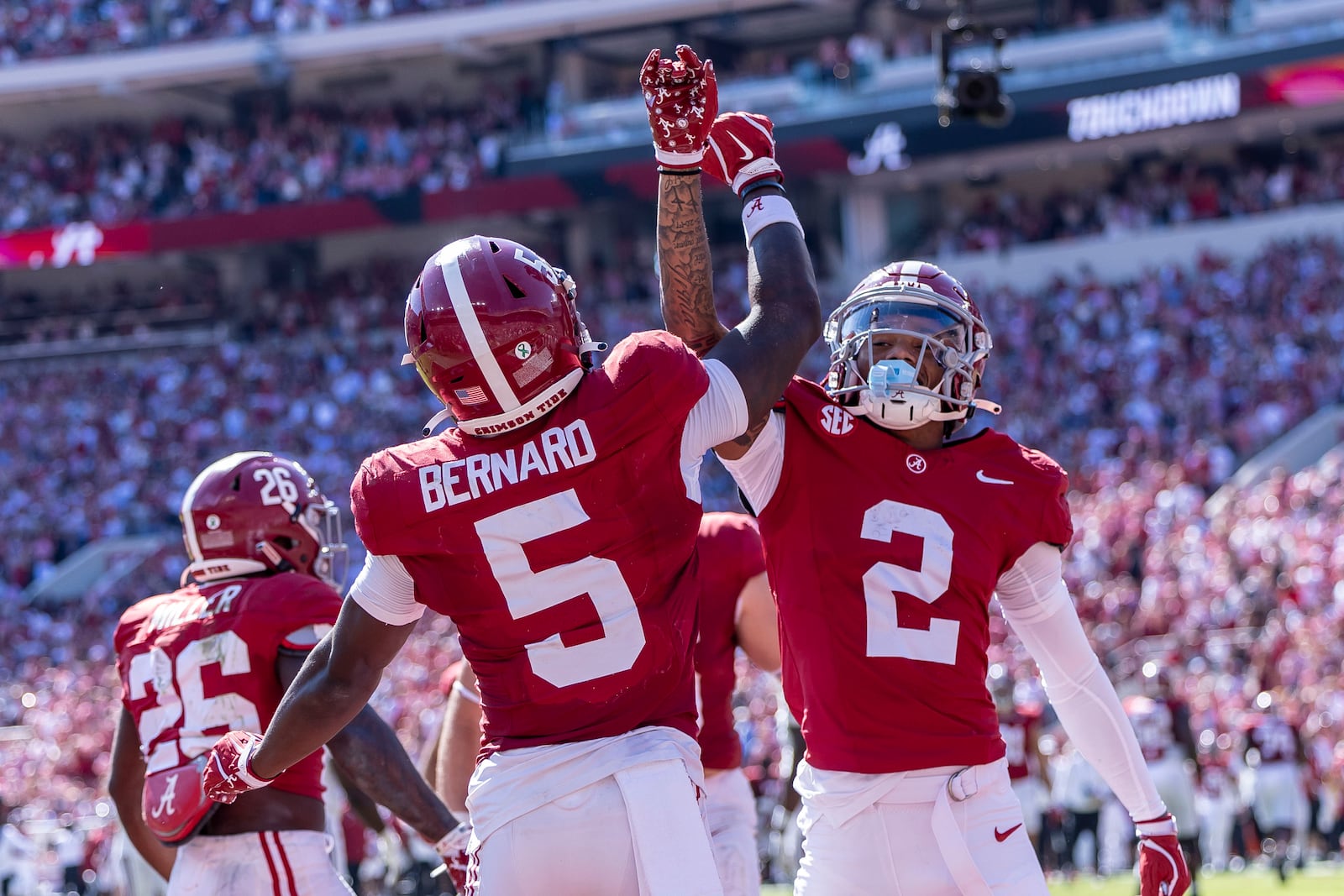 Alabama wide receivers Germie Bernard (5) and Ryan Williams (2) celebrate a touchdown by Bernard during the second half of an NCAA college football game against South Carolina, Saturday, Oct. 12, 2024, in Tuscaloosa, Ala. (AP Photo/Vasha Hunt)