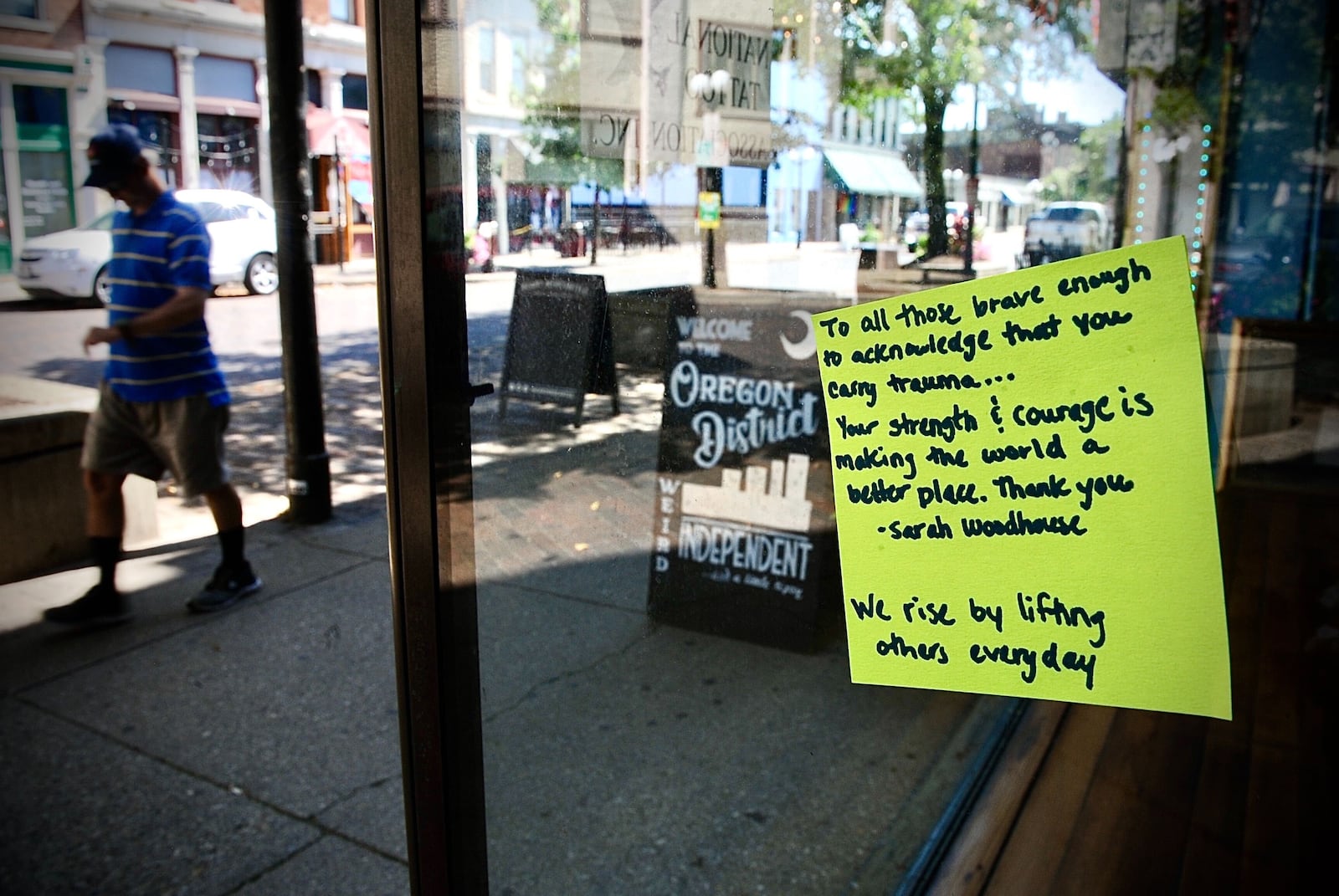 Messages of faith and hope appear on windows in the Oregon District Tuesday Aug. 2, 2021. MARSHALL GORBY\STAFF