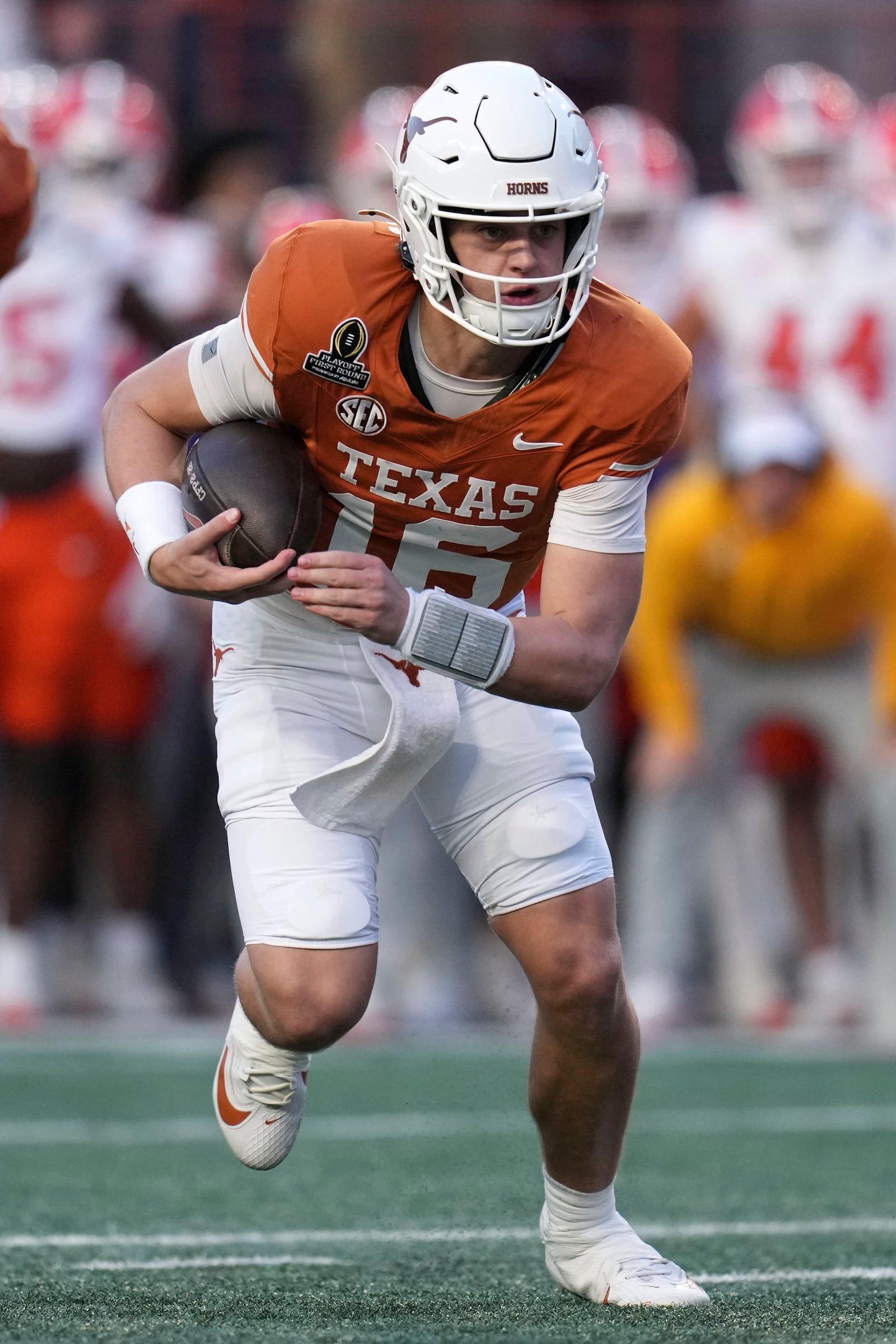 Texas quarterback Arch Manning runs up field during the second half against Clemson in the first round of the College Football Playoff, Saturday, Dec. 21, 2024, in Austin, Texas. (AP Photo/Eric Gay)