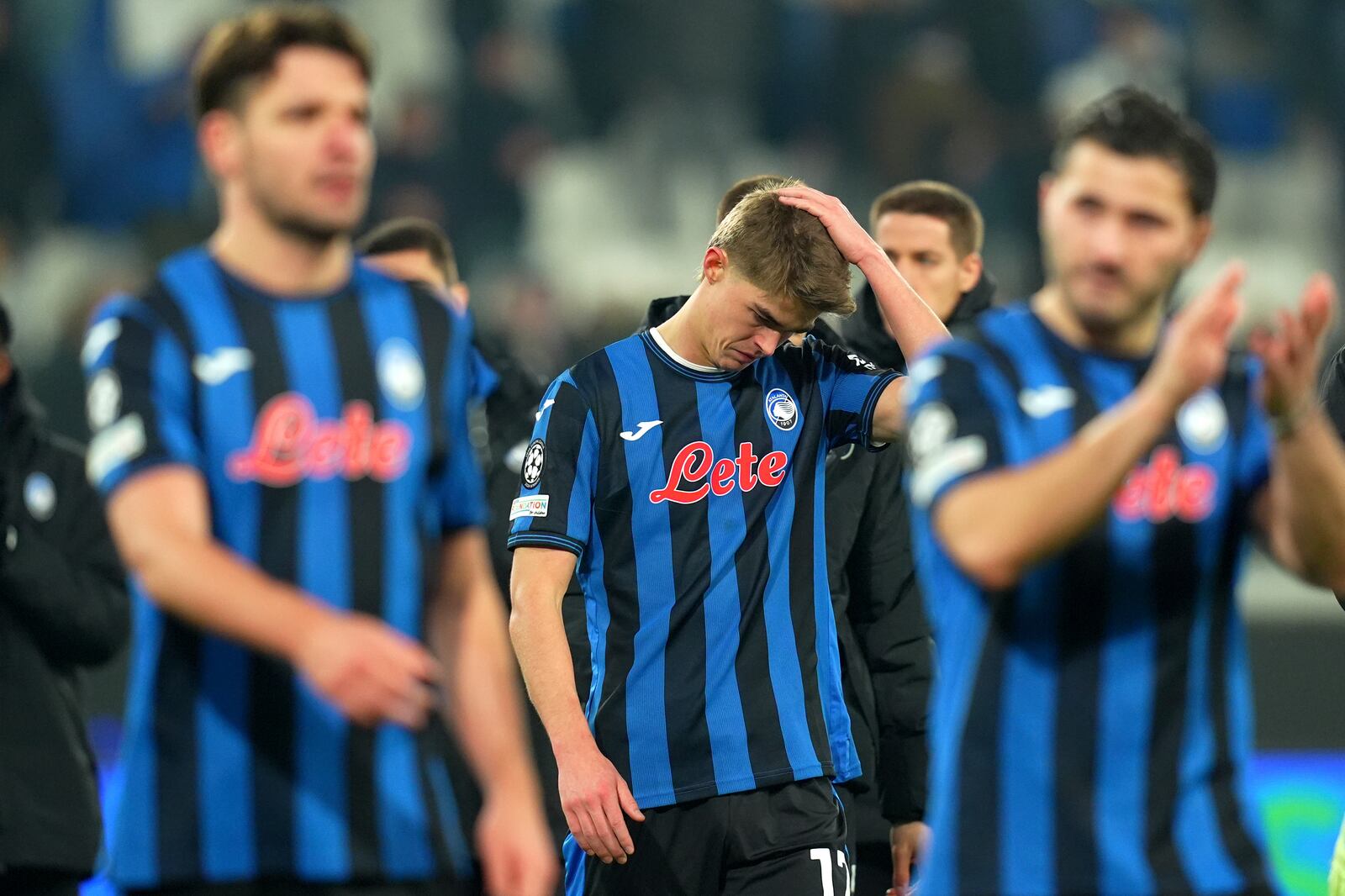 Atalanta's Charles De Ketelaere, center, reacts after a Champions League, playoff second leg, soccer match between Atalanta and Club Brugge in Bergamo, Italy, Tuesday, Feb.18, 2025. (Spada/LaPresse via AP)